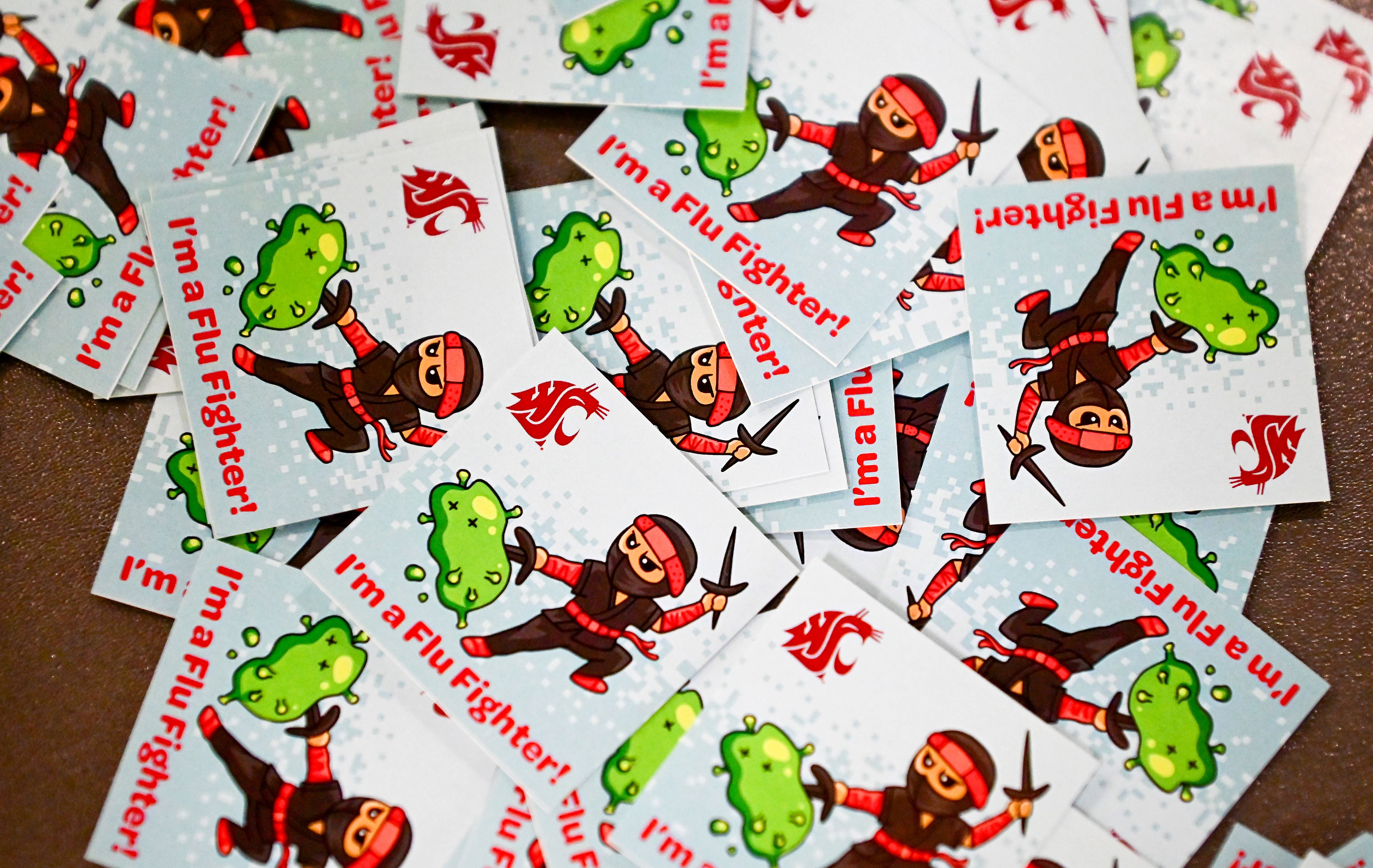 Stickers are laid out Friday at the Flu Shot Friday clinic at Washington State University in Pullman.