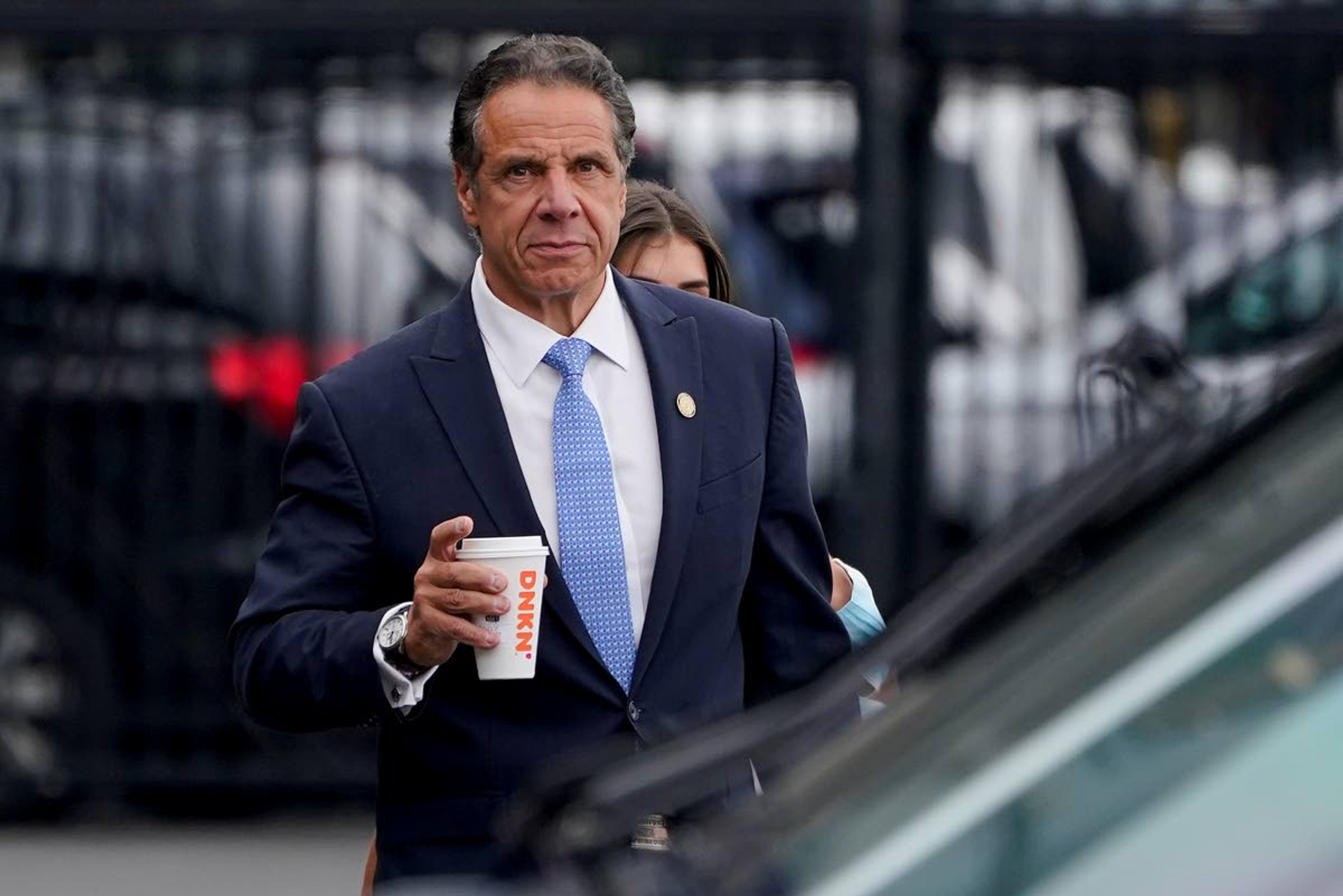 New York Gov. Andrew Cuomo prepares to board a helicopter after announcing his resignation, Tuesday, Aug. 10, 2021, in New York. Cuomo says he will resign over a barrage of sexual harassment allegations. The three-term Democratic governor's decision, which will take effect in two weeks, was announced Tuesday as momentum built in the Legislature to remove him by impeachment. (AP Photo/Seth Wenig)