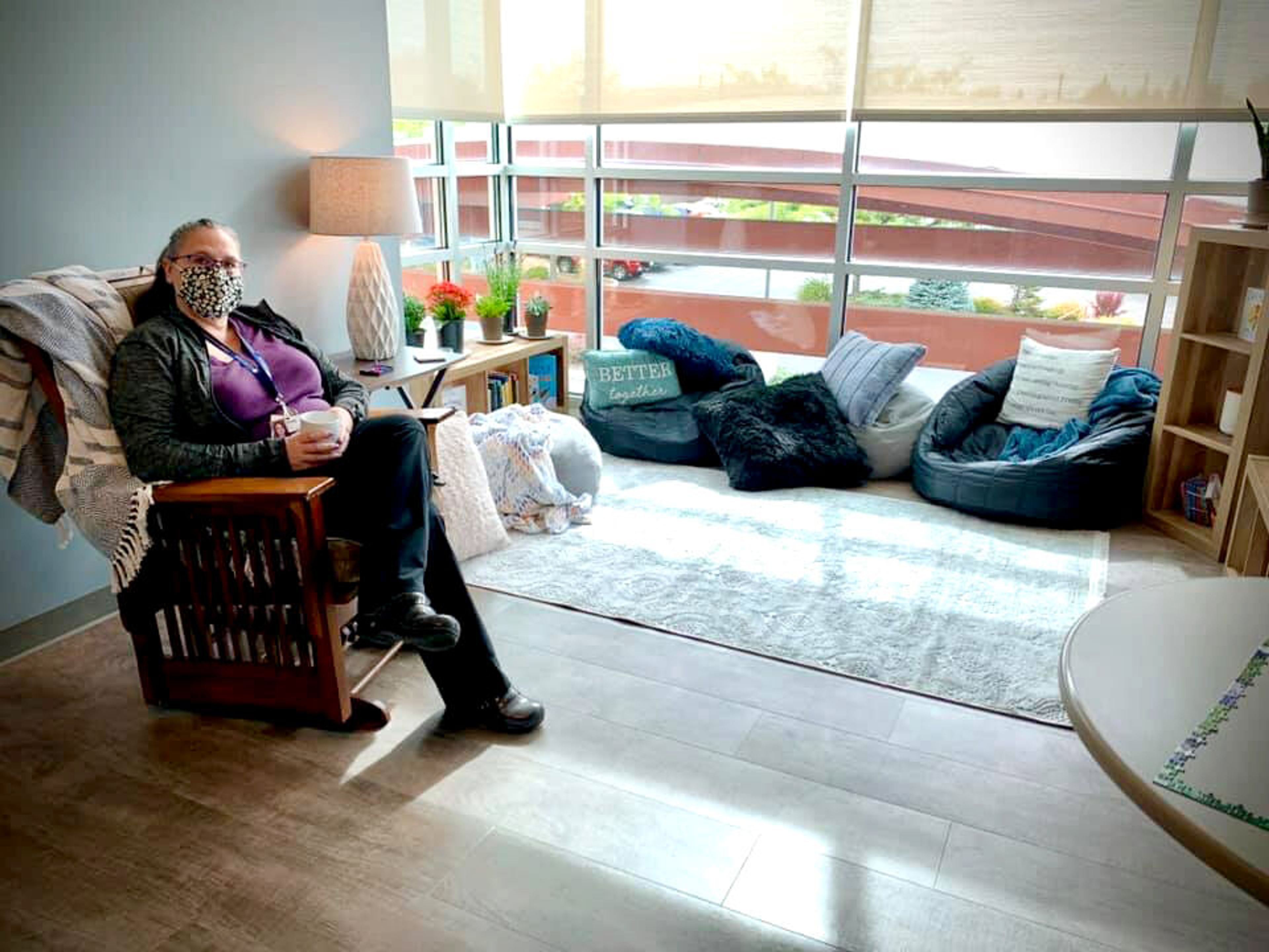 Shelly Nichols, a registered nurse and director of Gritman Medical Center's critical care and medical/surgical units, sits in a private "meditation and calming" space created at the Moscow facility by one of Gritman's nurses.