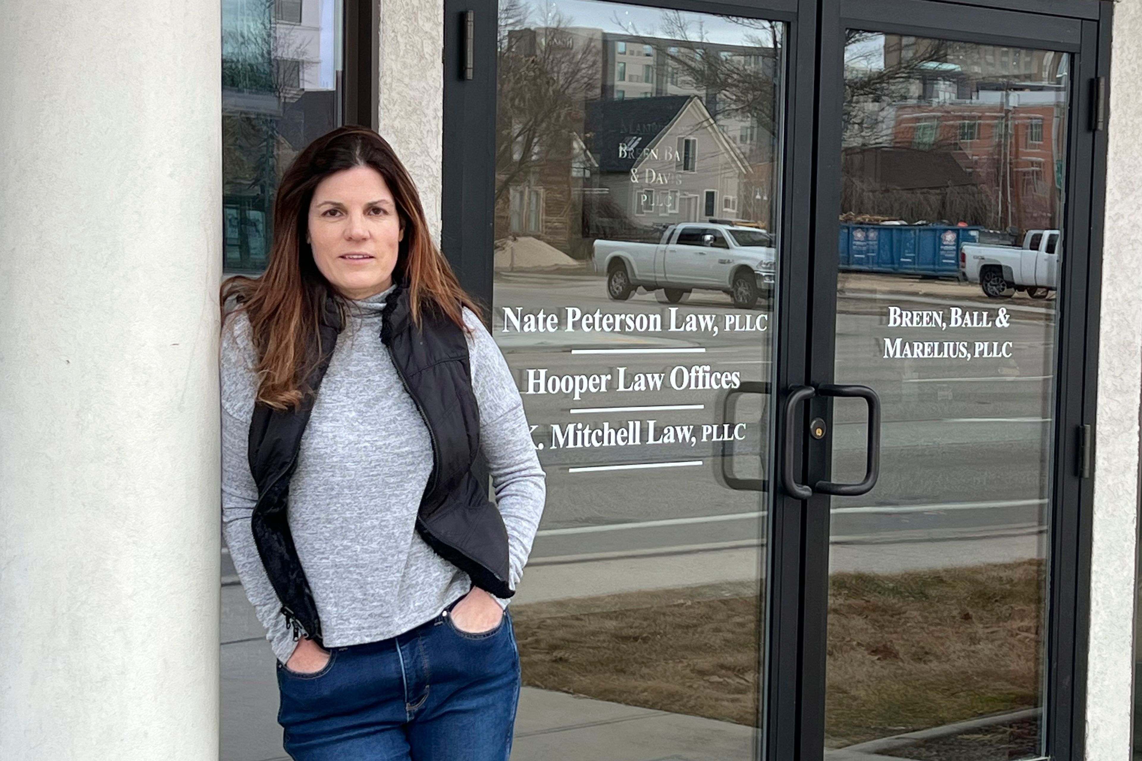 Erin Carver stands outside her attorney's office in Boise, Idaho, Monday, Feb. 28, 2022. A legal loophole that allows parents of teens to nullify child custody agreements by arranging child marriages will remain in effect under a ruling from the Idaho Supreme Court on Tuesday, Oct. 18.