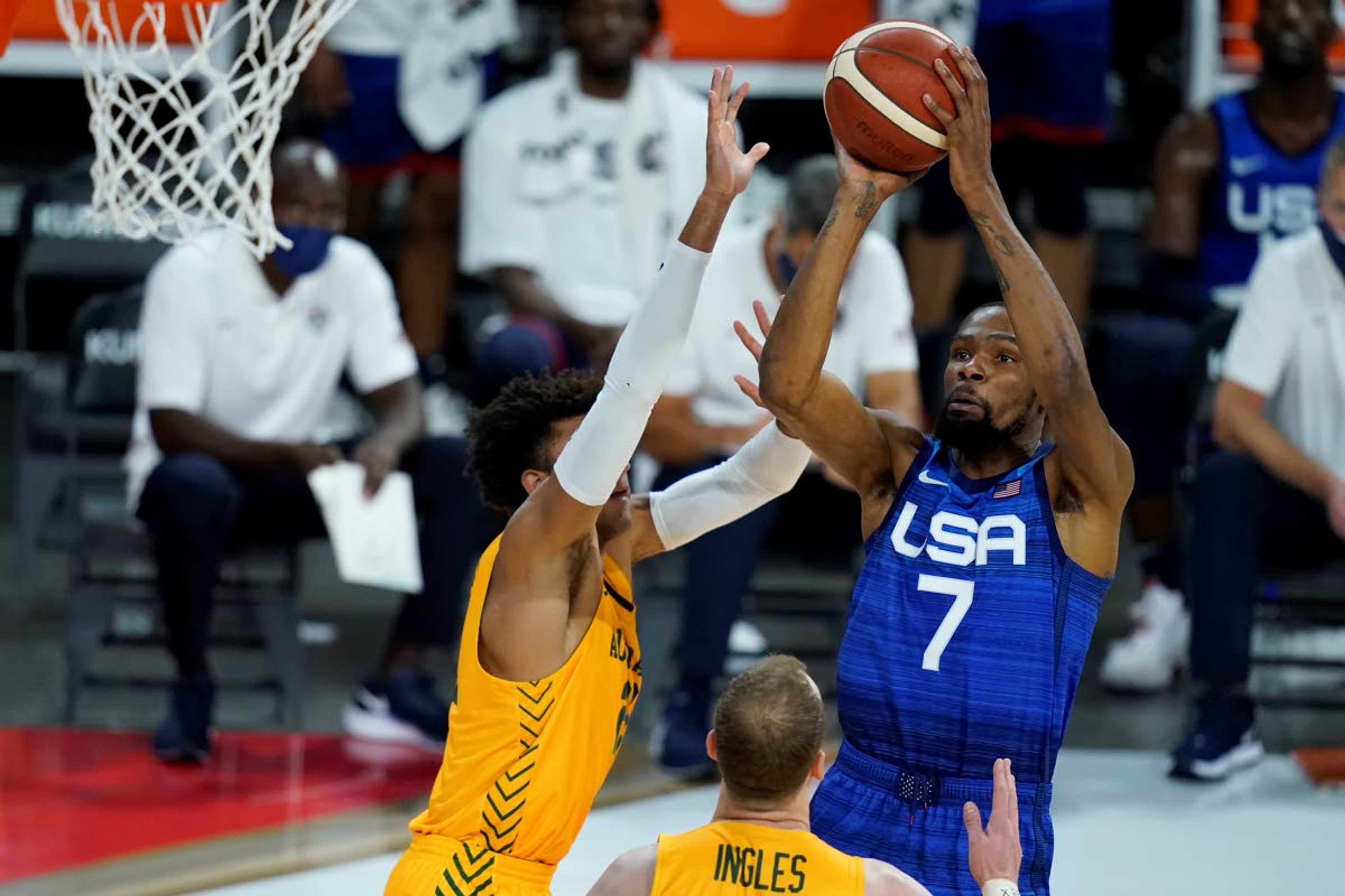 United States' Kevin Durant shoots over Australia's Matisse Thybulle during an exhibition basketball game Monday, July 12, 2021, in Las Vegas. (AP Photo/John Locher)