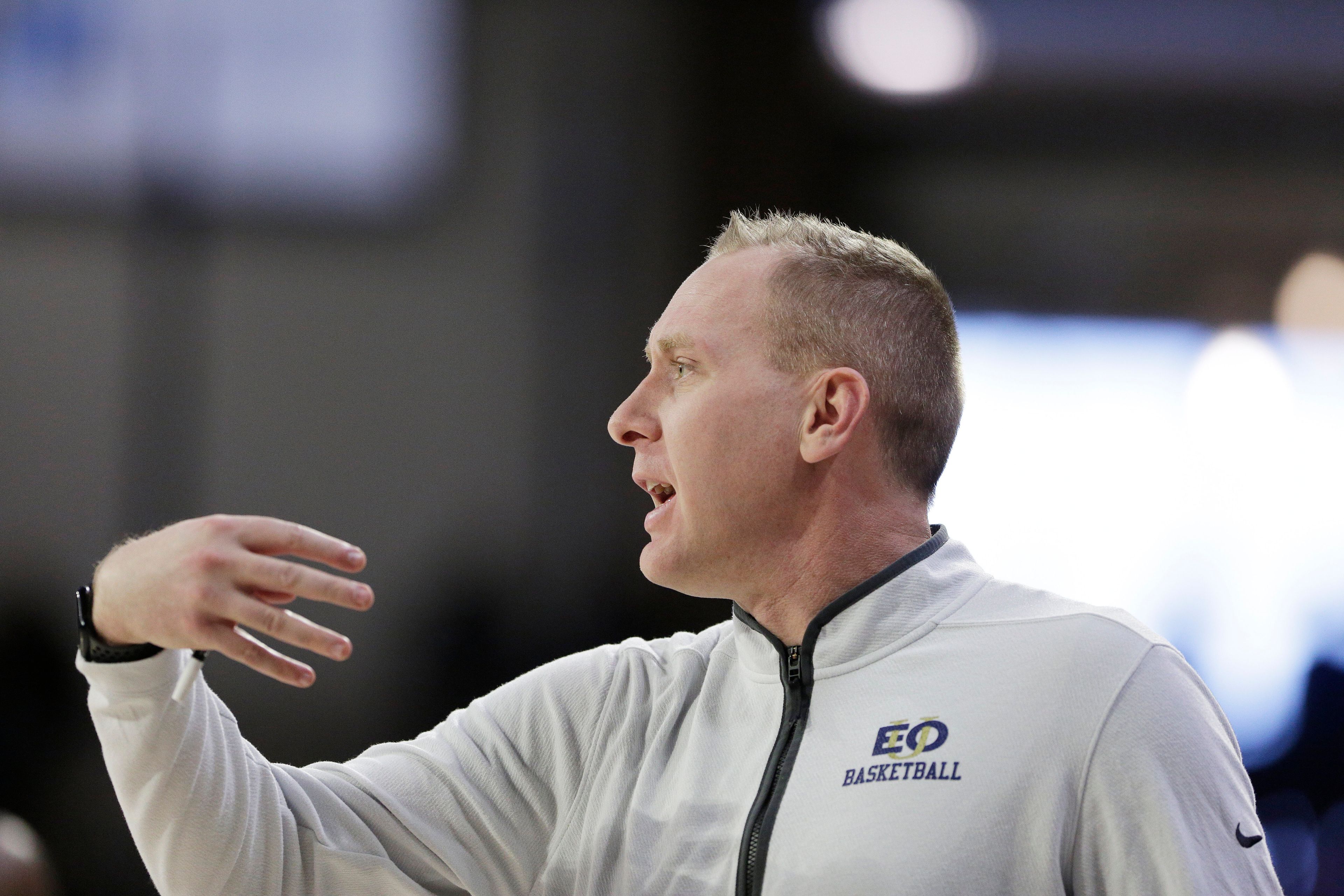 Eastern Oregon head coach Chris Kemp directs his team during the first half of a college basketball game against Gonzaga, Wednesday, Dec. 28, 2022, in Spokane, Wash. (AP Photo/Young Kwak)