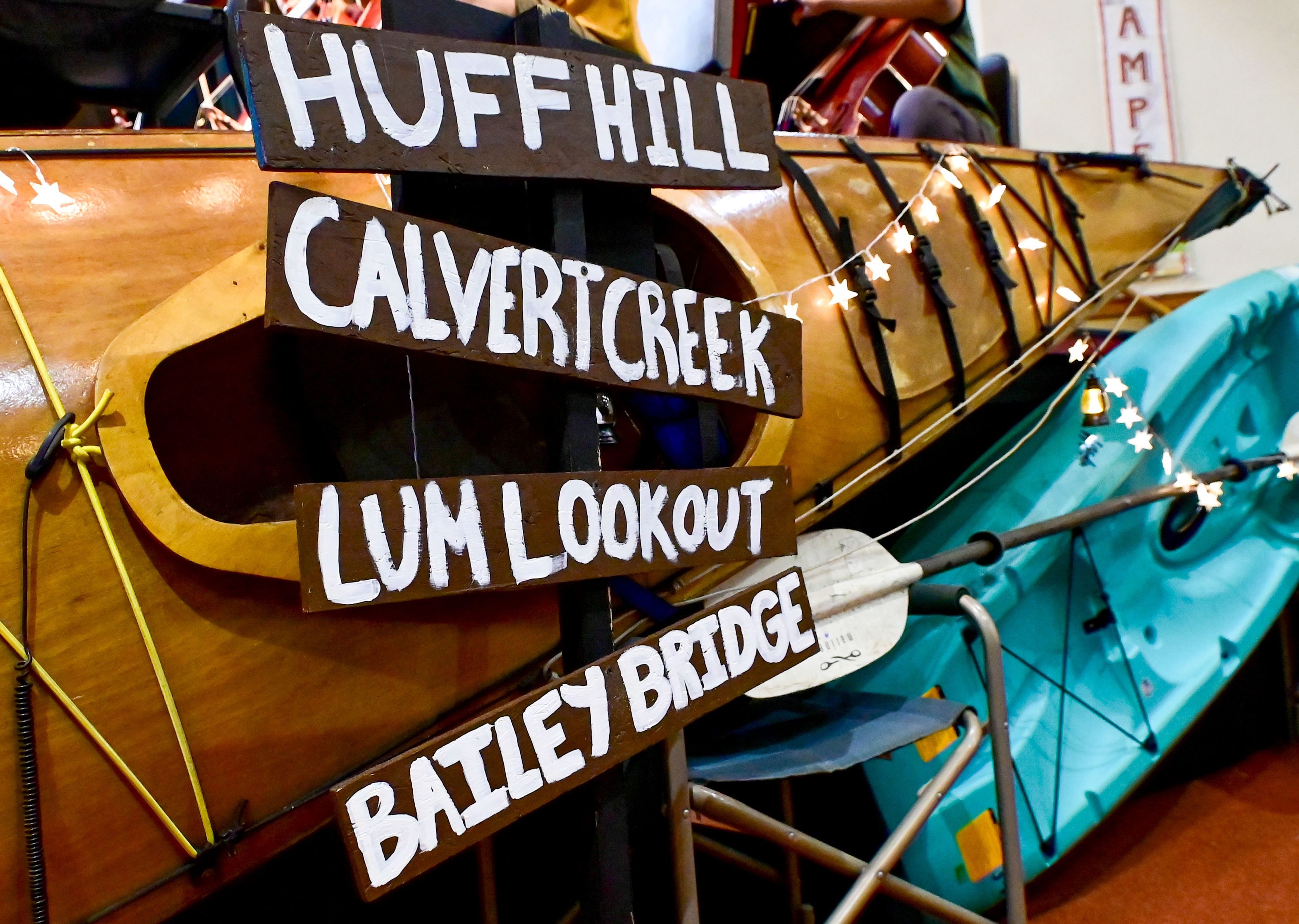 A handmade sign by Moscow High School students sits in the front of the auditorium to help illustrate the annual Arts Fest’s camping theme on Wednesday.