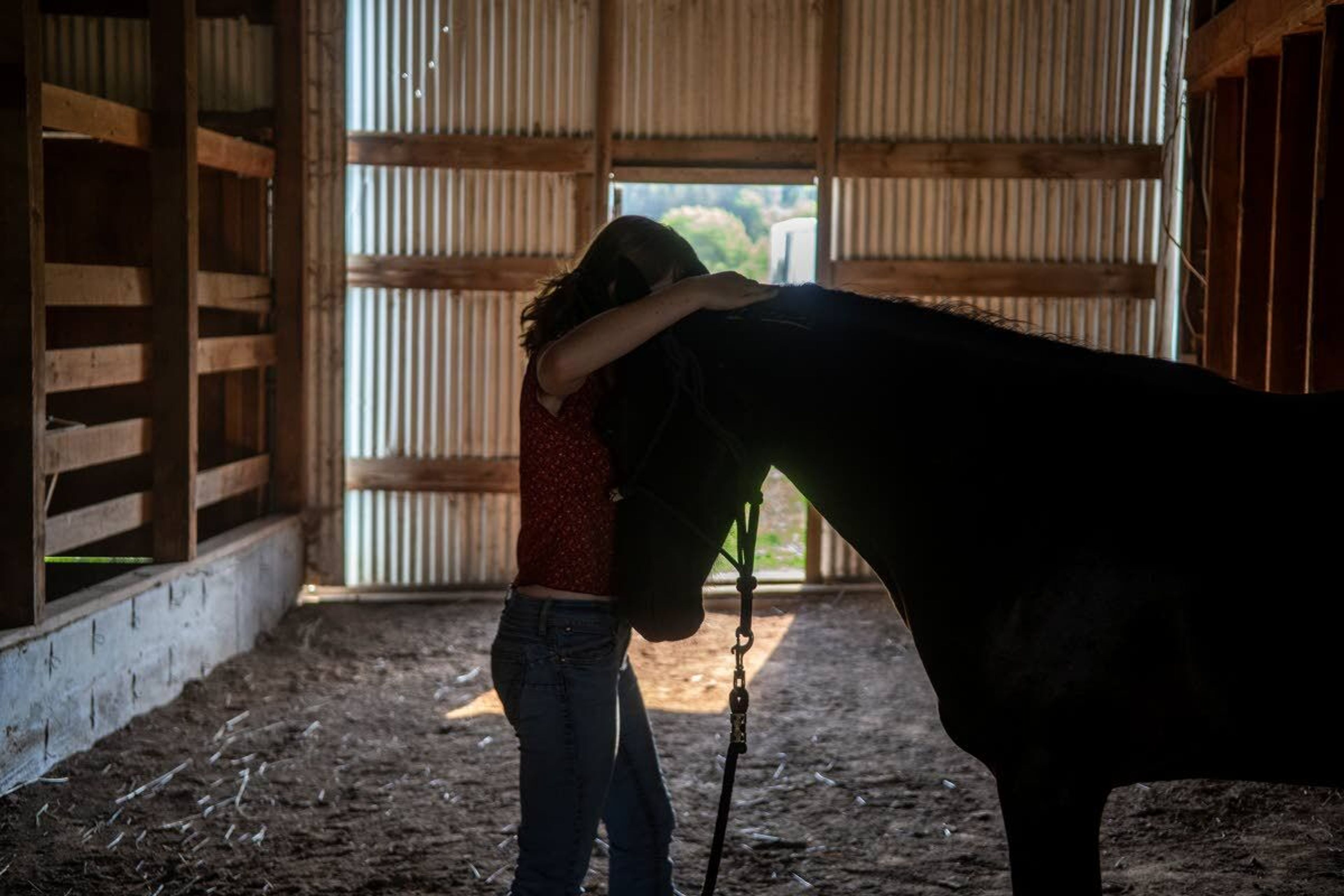 Hylton rests her head on Lyra’s after a morning of training. When speaking about her passion for horses, Hylton said, “They are like my favorite thing in the world.”