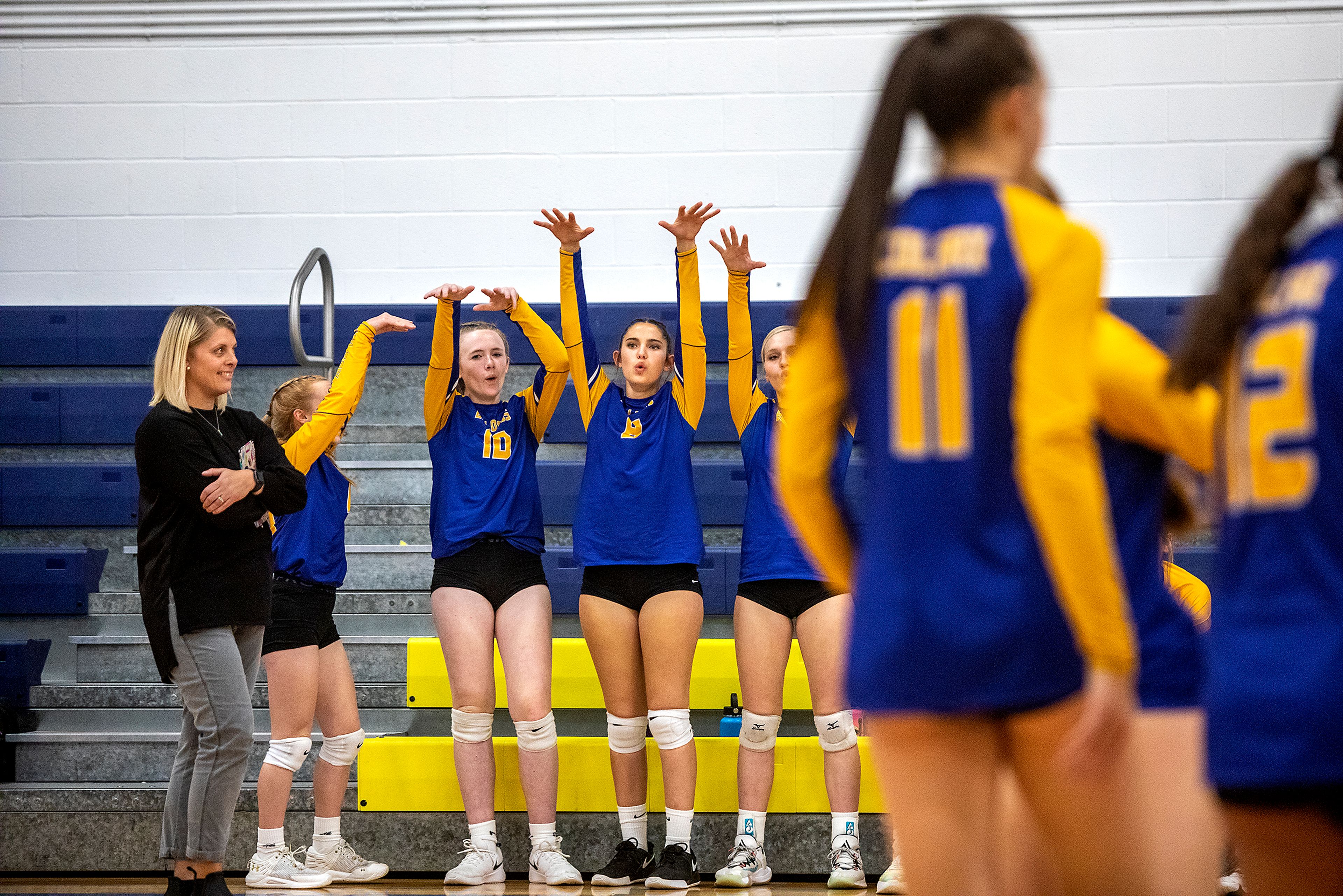 The Colfax bench celebrates a point against St. George's at Colfax on Tuesday.