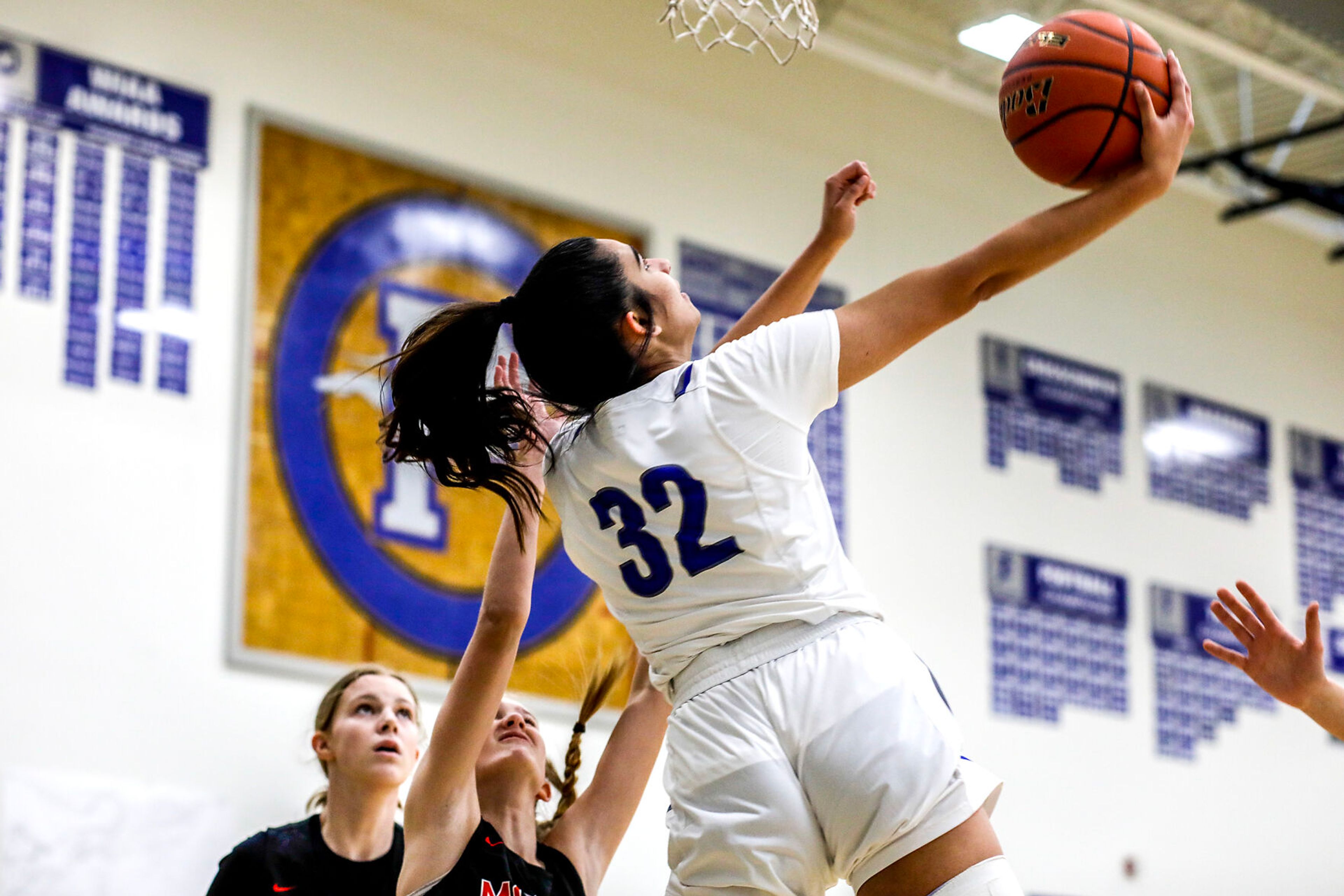 Pullman post Sehra Singh, front, shoots a layup during Saturday's nonleague girls basketball game.