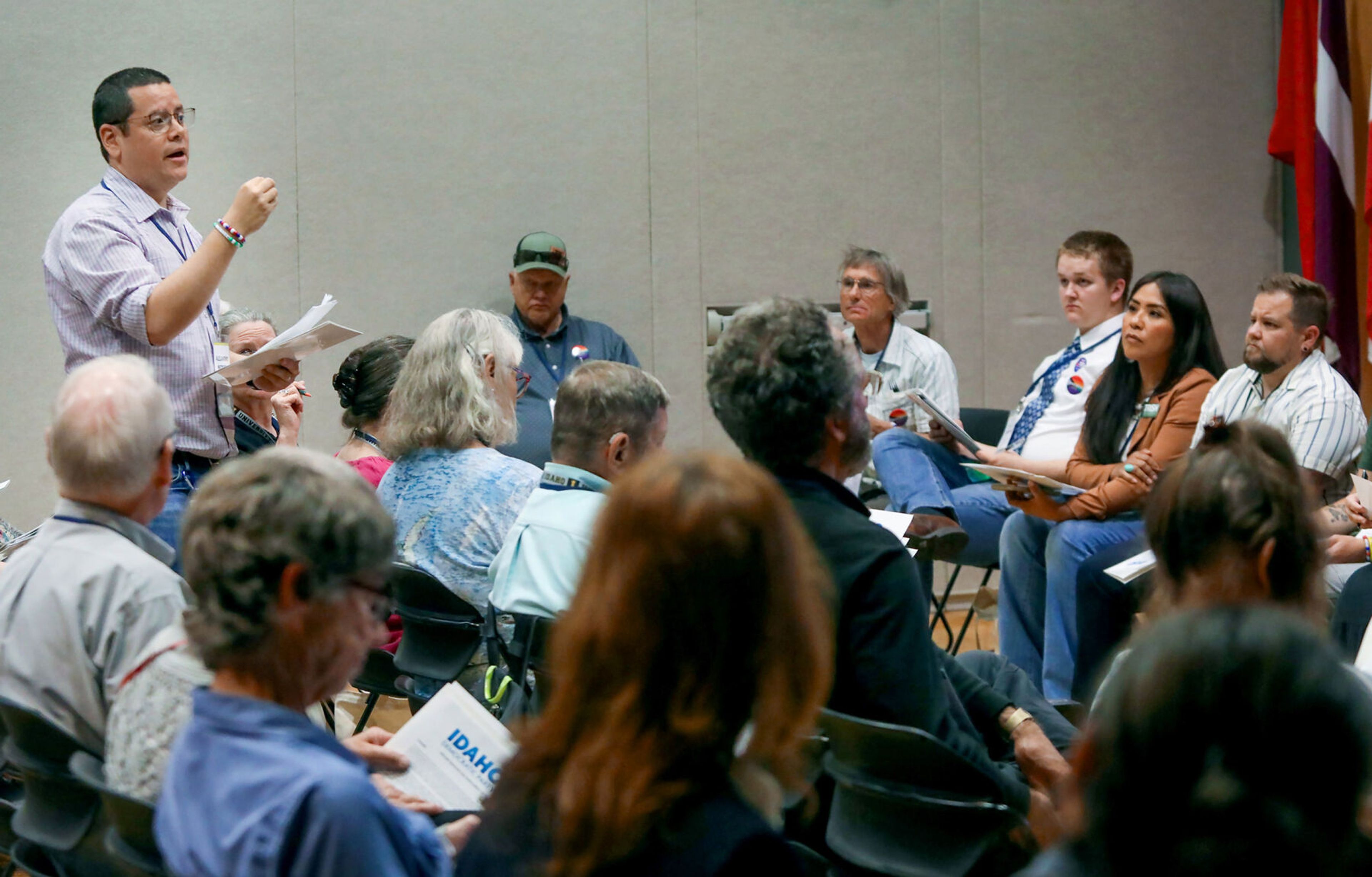 Alejandro Necochea, of Ada County, stands to give feedback during the Platform Hearing at the Idaho Democratic Convention on Saturday in Moscow.