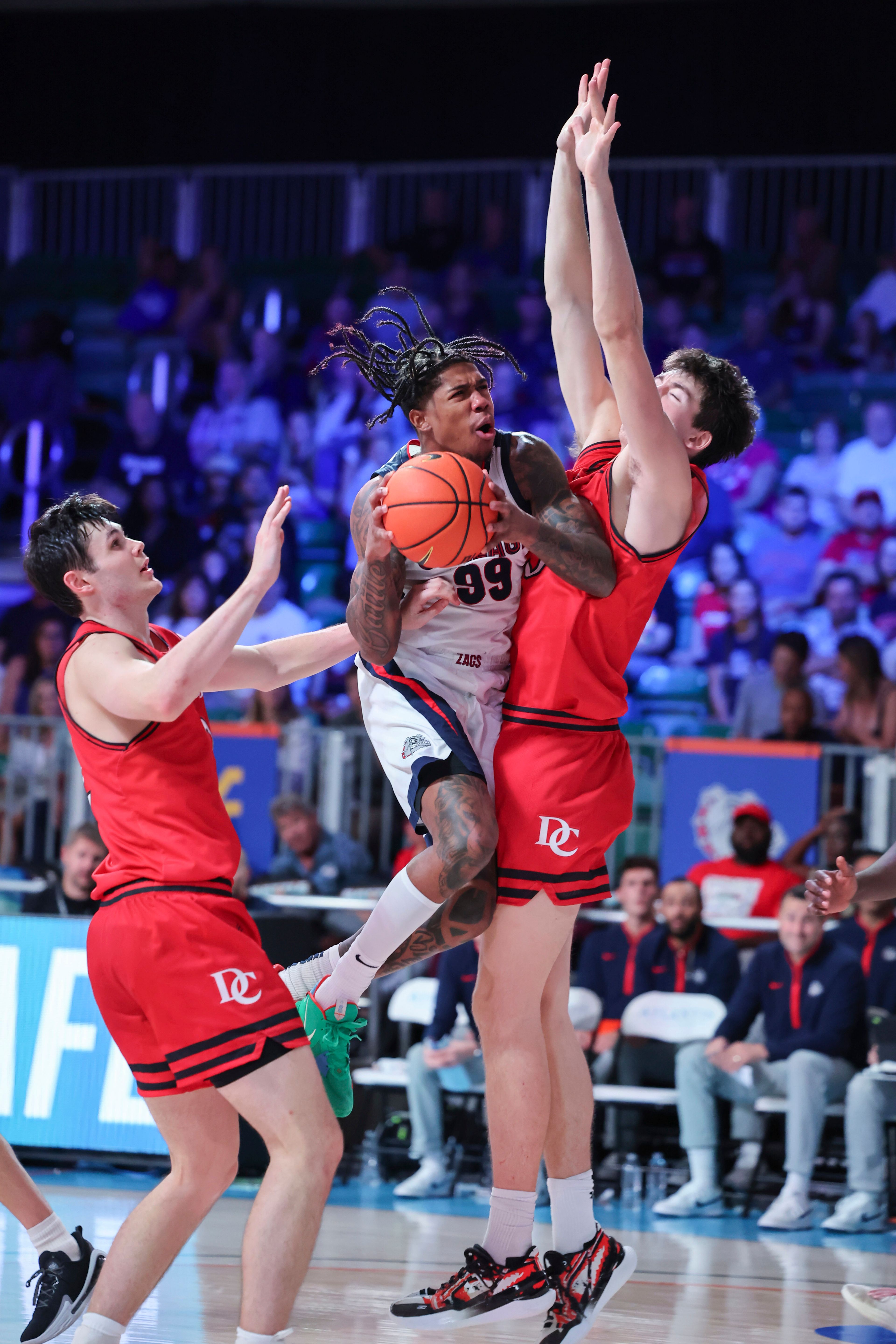 In this photo provided by Bahamas Visual Services, Gonzaga's Khalif Battle (99) controls the ball during an NCAA college basketball game against Davidson, Friday, Nov. 29, 2024, in Paradise Island, Bahamas. (Tim Aylen/Bahamas Visual Services via AP)