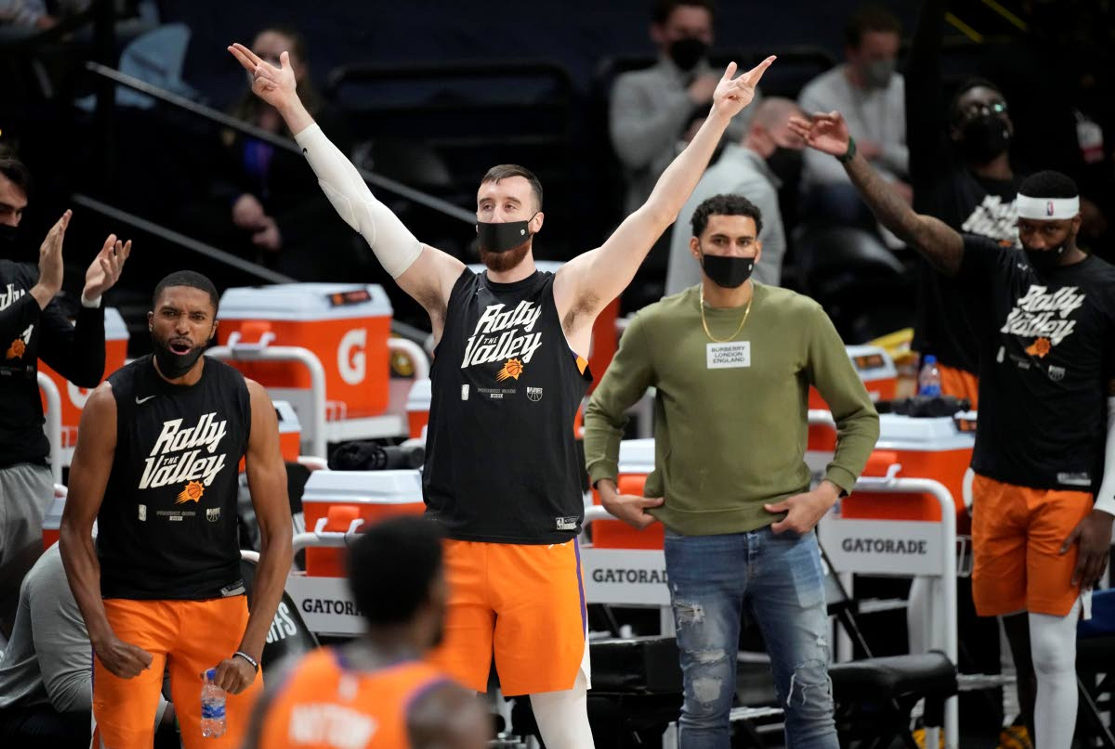 Phoenix Suns react after a basket by Chris Paul against the Denver Nuggets during the second half of Game 3 of an NBA second-round playoff series Friday, June 11, 2021, in Denver. (AP Photo/David Zalubowski)