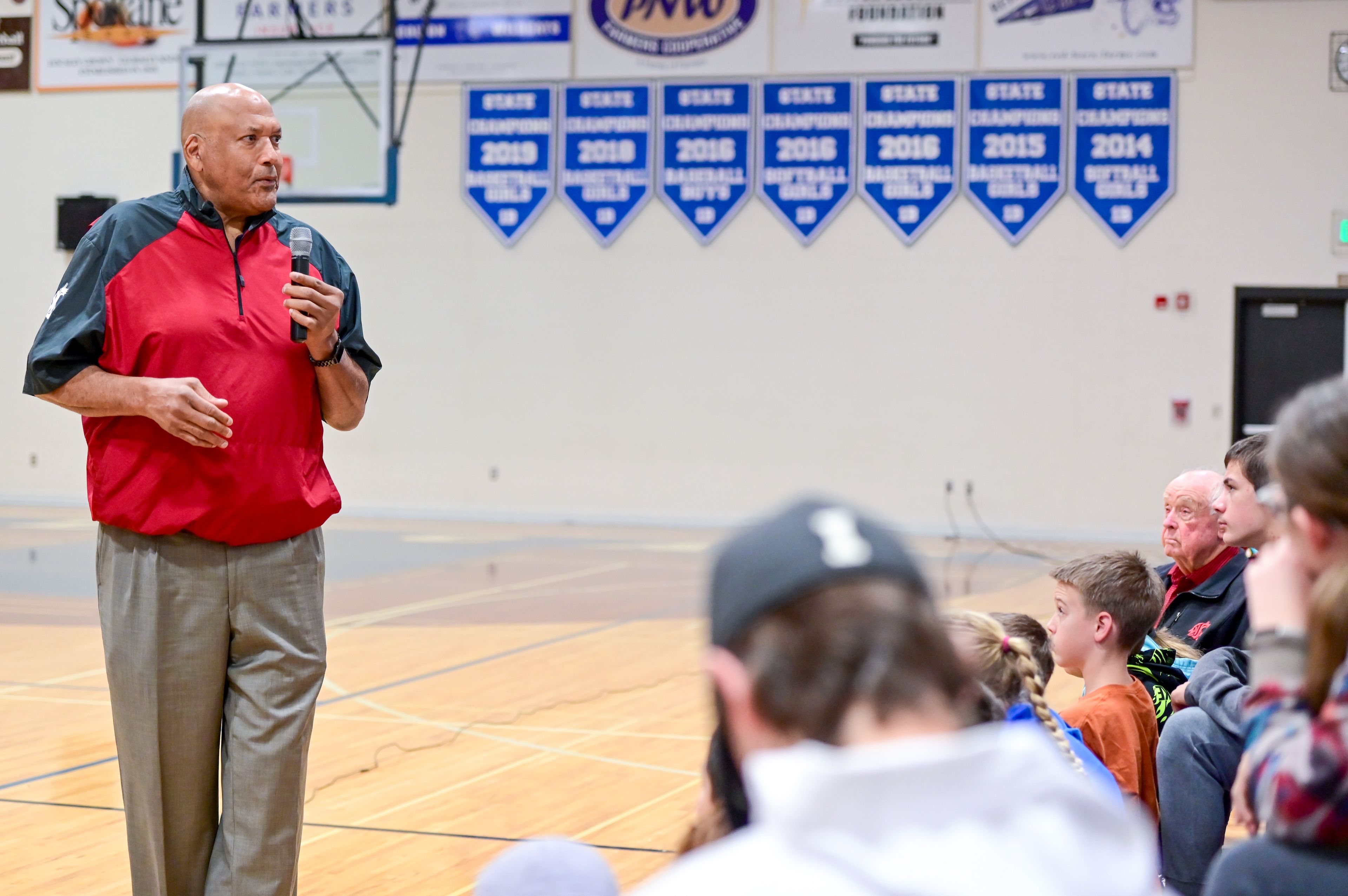 Former NBA and WSU athlete James Donaldson speaks to students at Colton High School about mental health on Tuesday.