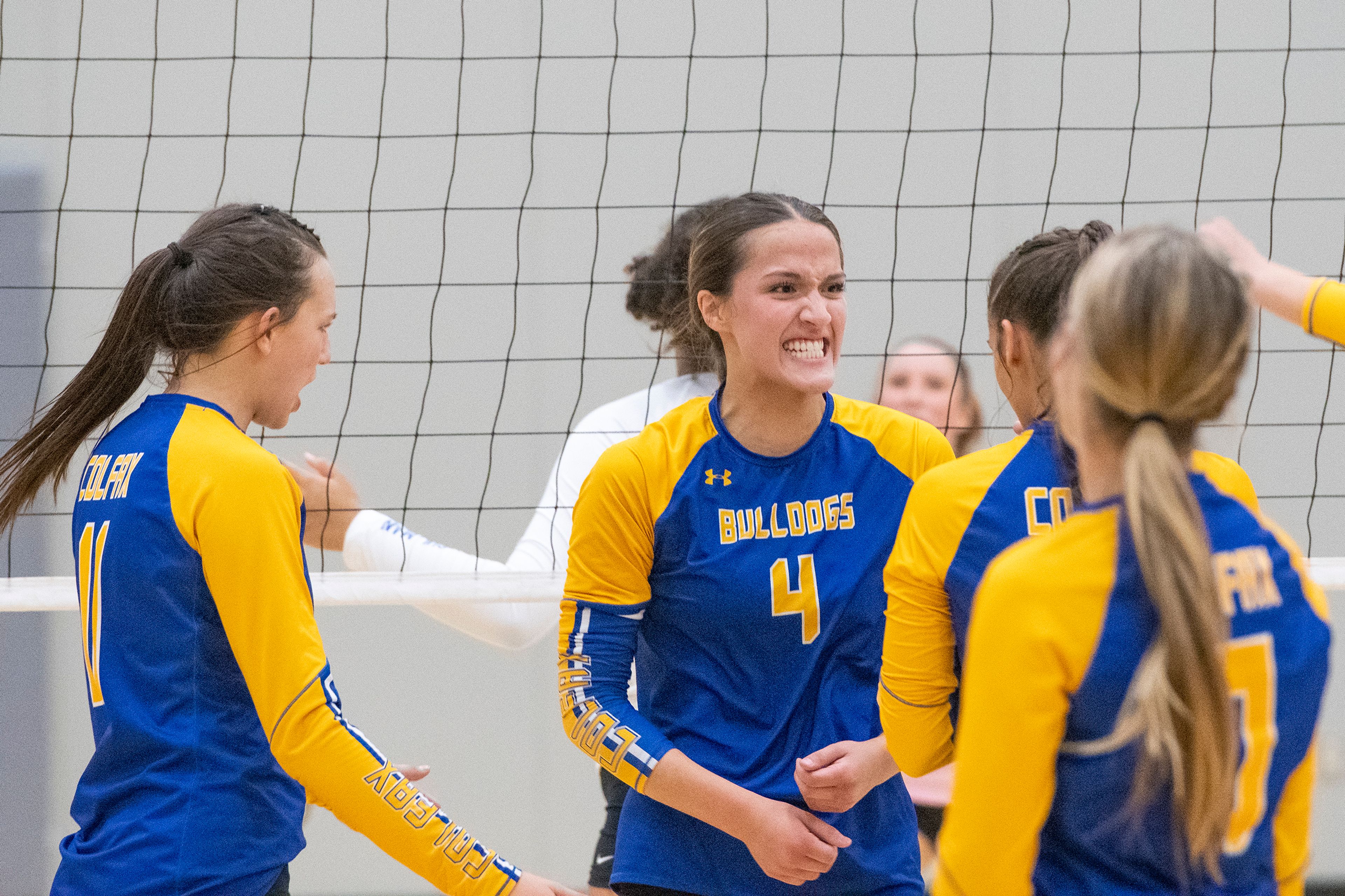 Colfax’s Olivia Ng (4) reacts after scoring a point during a nonleague match at Pullman High School.