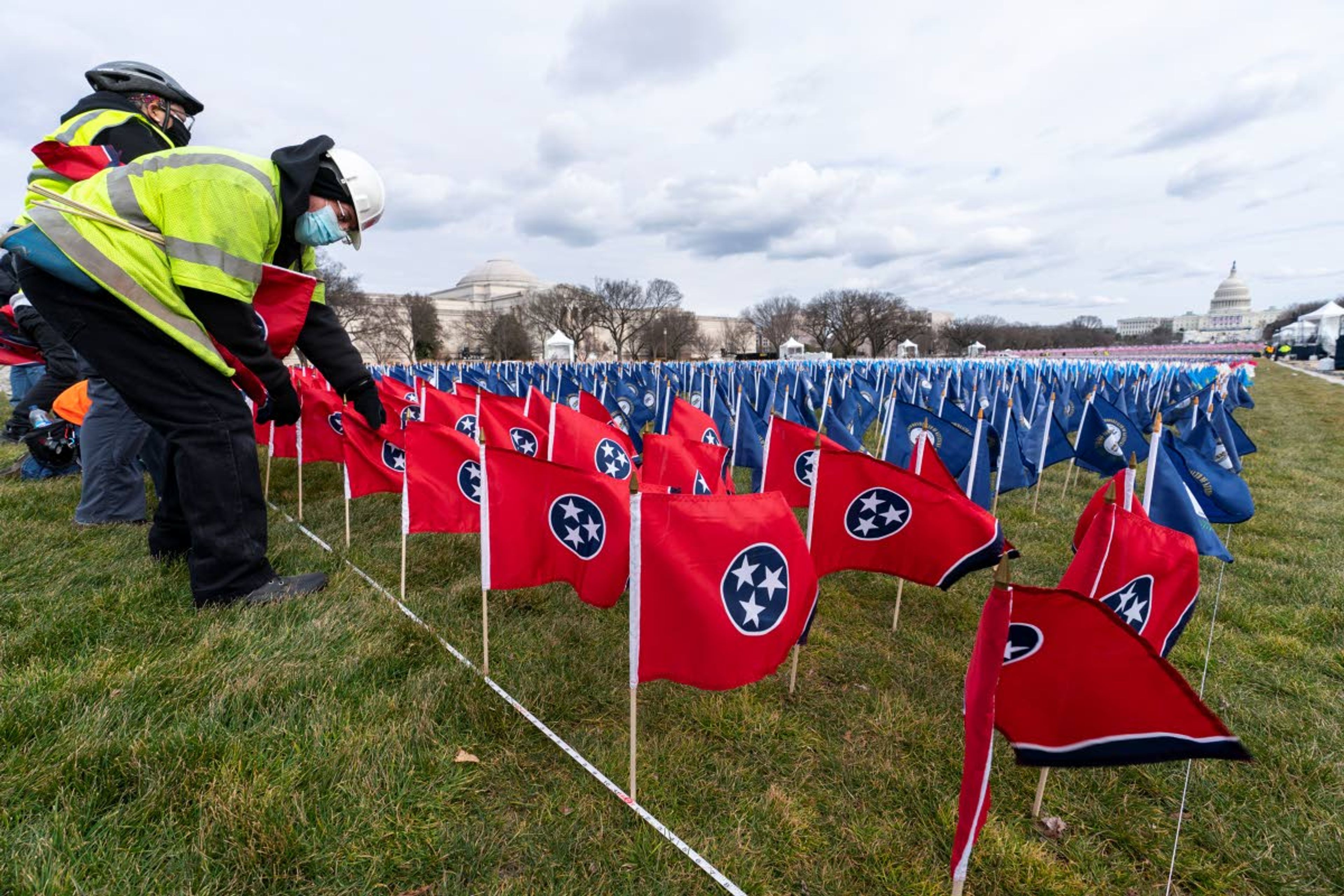 State flags including the Tennessee state flag, in front, are placed on the National Mall ahead of the inauguration of President-elect Joe Biden and Vice President-elect Kamala Harris, Monday, Jan. 18, 2021, in Washington. (AP Photo/Alex Brandon)