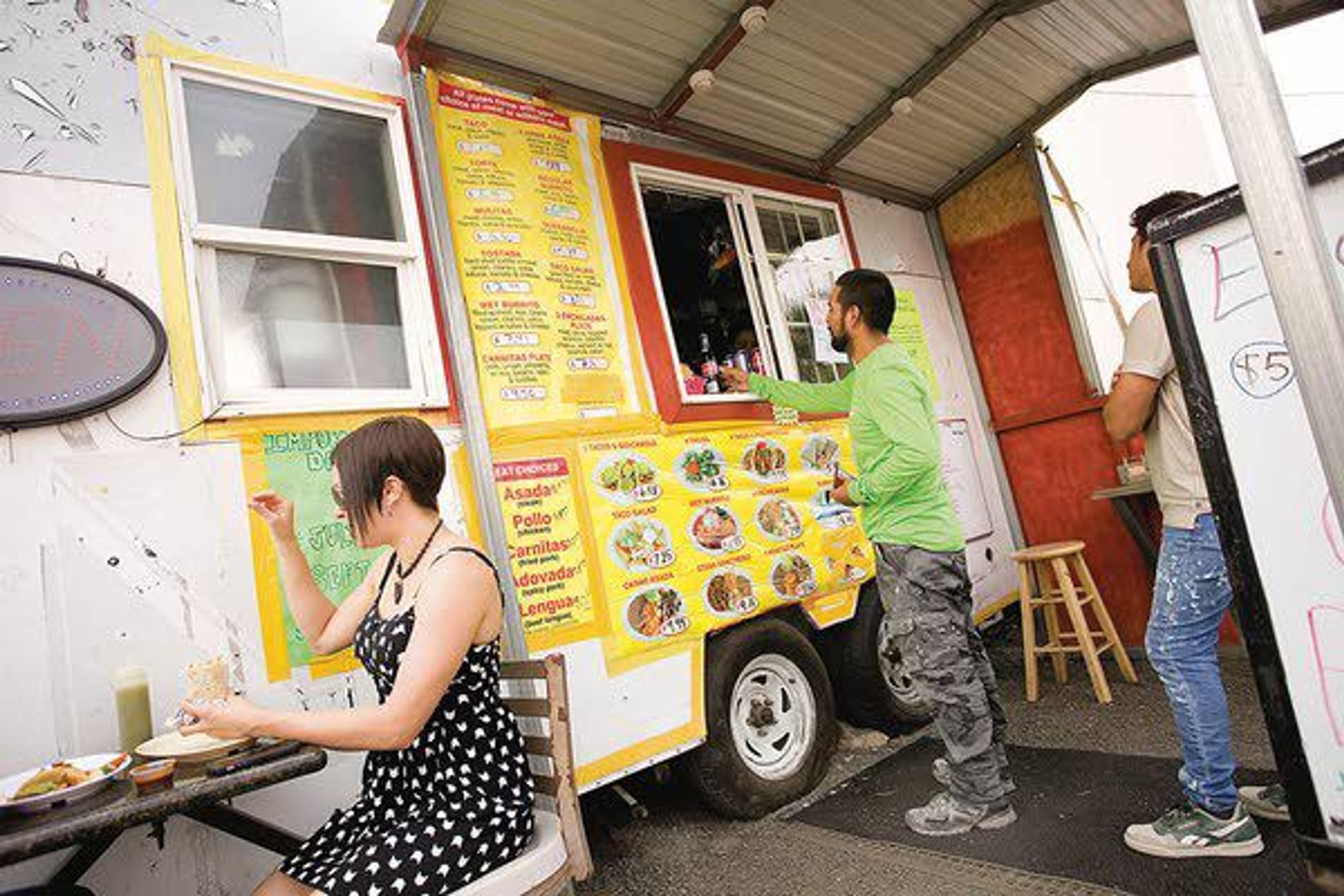 Customers line up for Taco Tuesday at Taqueria Las Torres in Moscow.