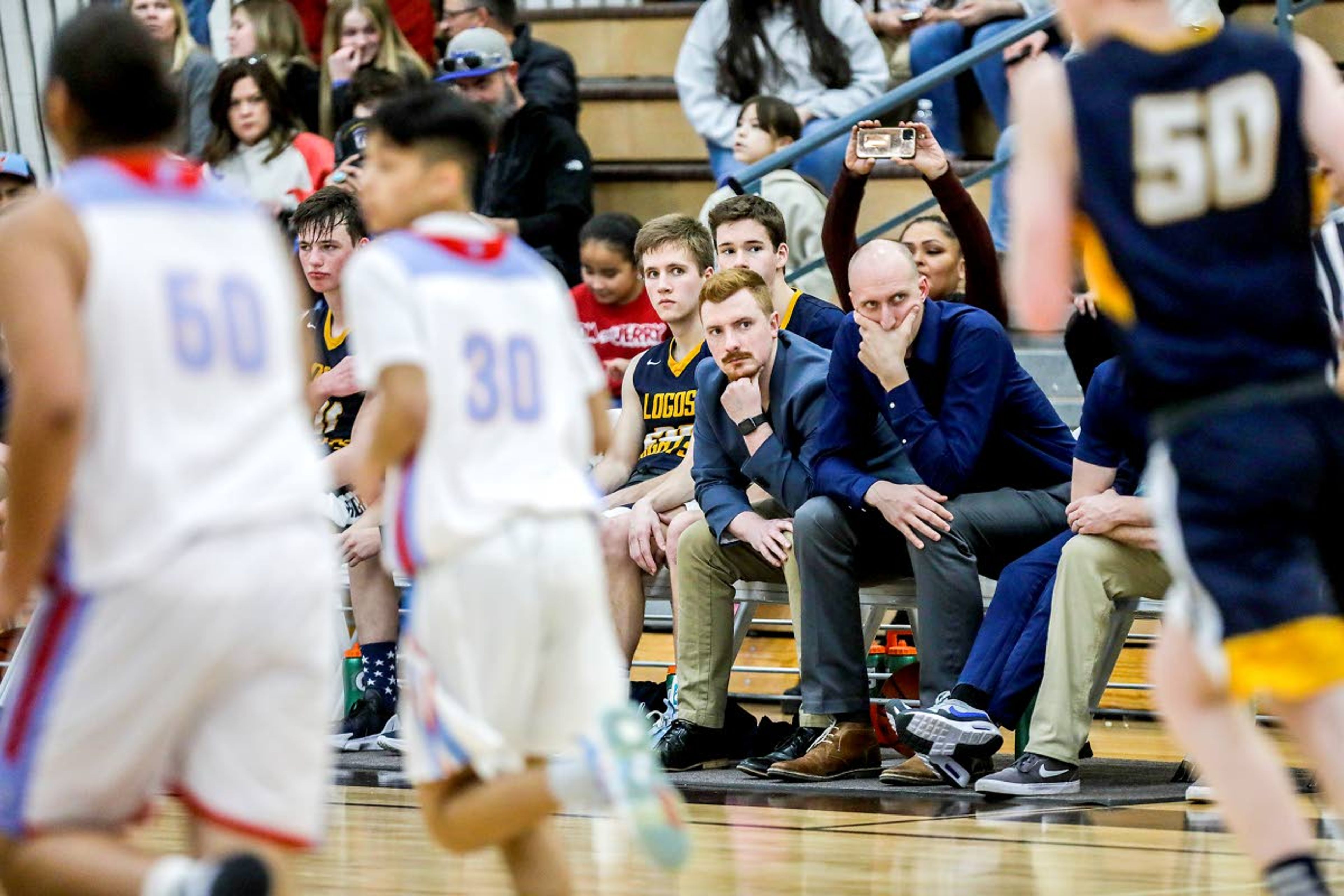 August Frank/Daily NewsThe Logos bench looks on as time winds down with the Knights trailing Lapwai in their Class 1A Division I state semifinal game Friday at Vallivue High School. The top-seeded Wildcats won, sending the Knights into today’s third-place game against Grace.