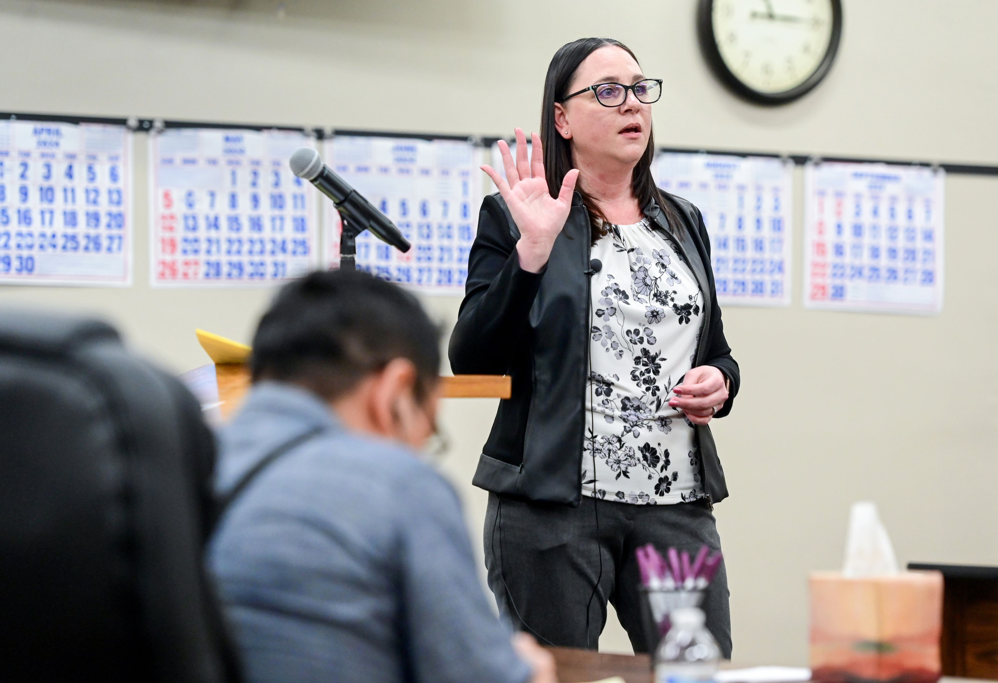 Prosecutor Tessa Scholl gives closing statements in the trial for Juan Trejo Perez, front, who was found guilty of molesting a teenage boy in Pullman, at the courthouse in Colfax on Wednesday.