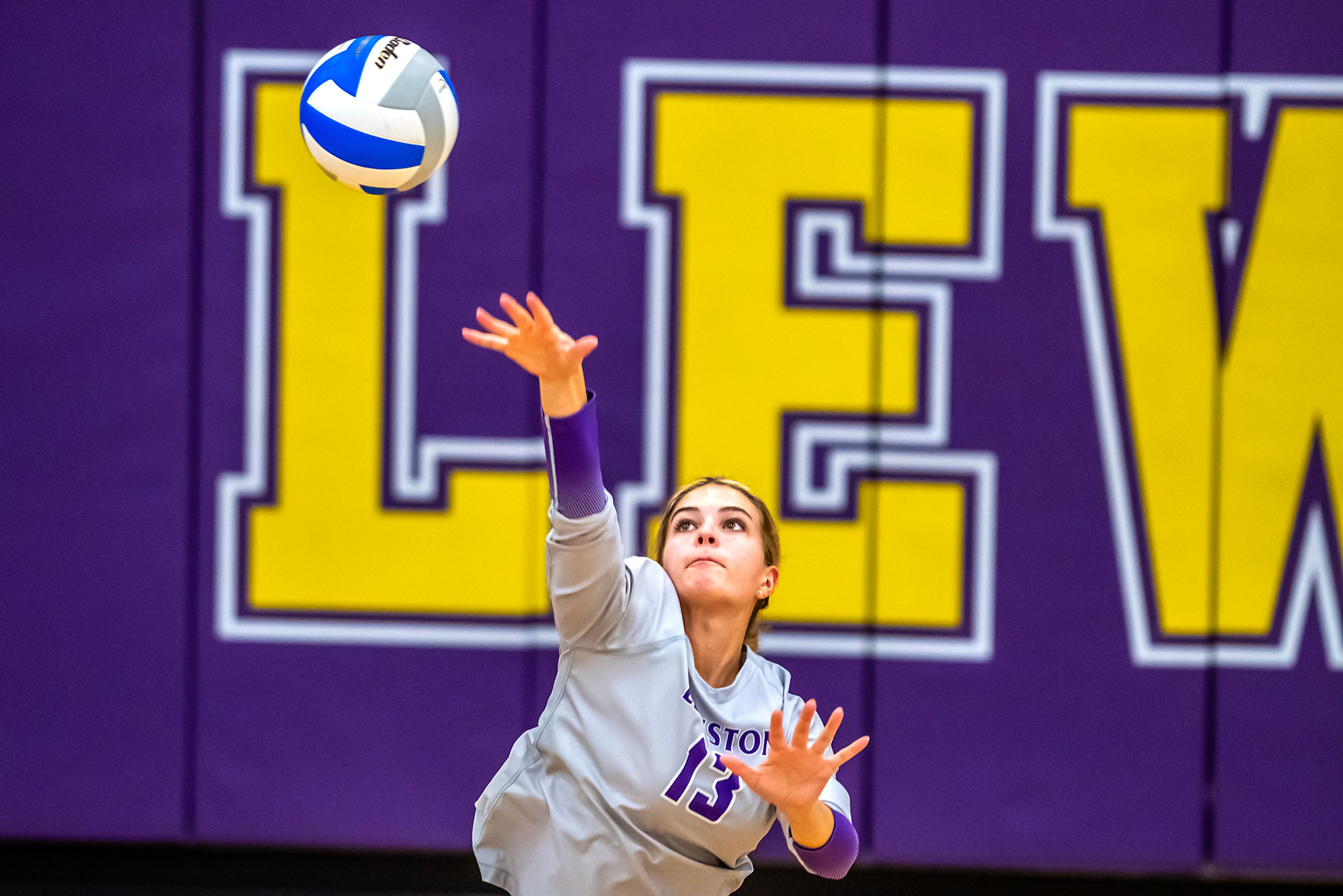 Lewiston outside hitter Kara Stinger serves the ball against Moscow in a 5A district tournament match Tuesday in Lewiston.