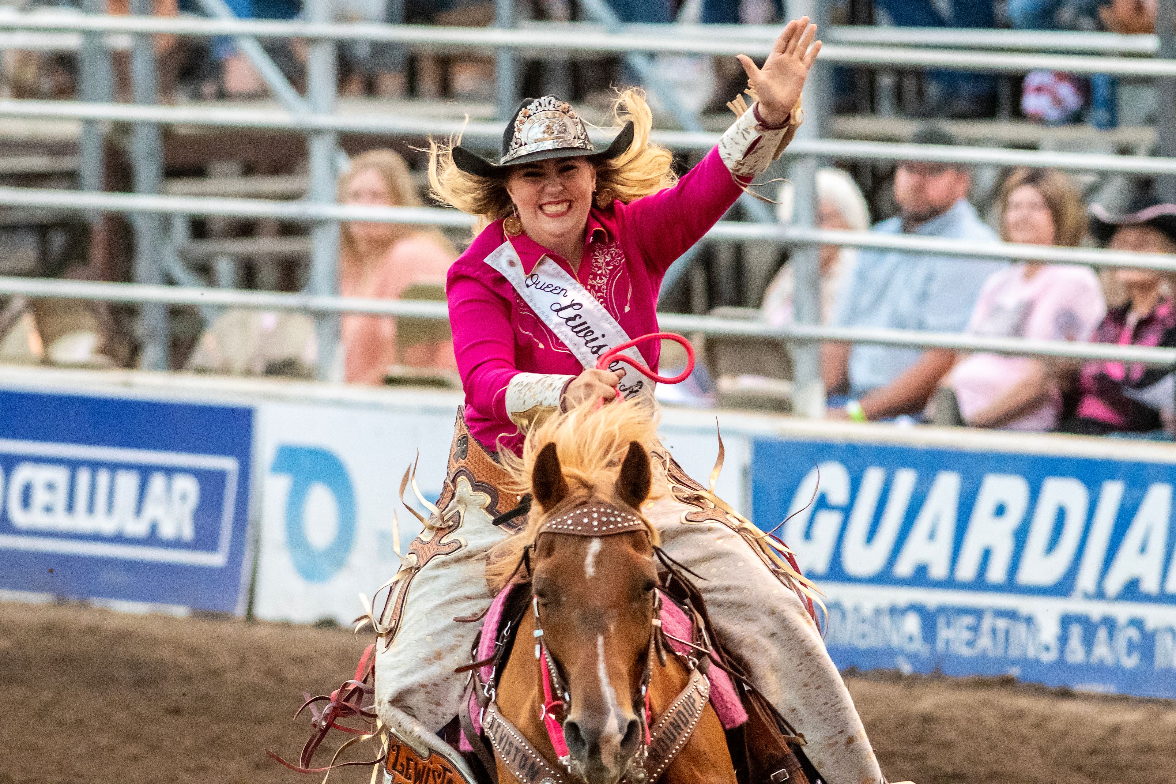 Queen Tabitha Neville rides around the arena on day 3 of the Lewiston Roundup.