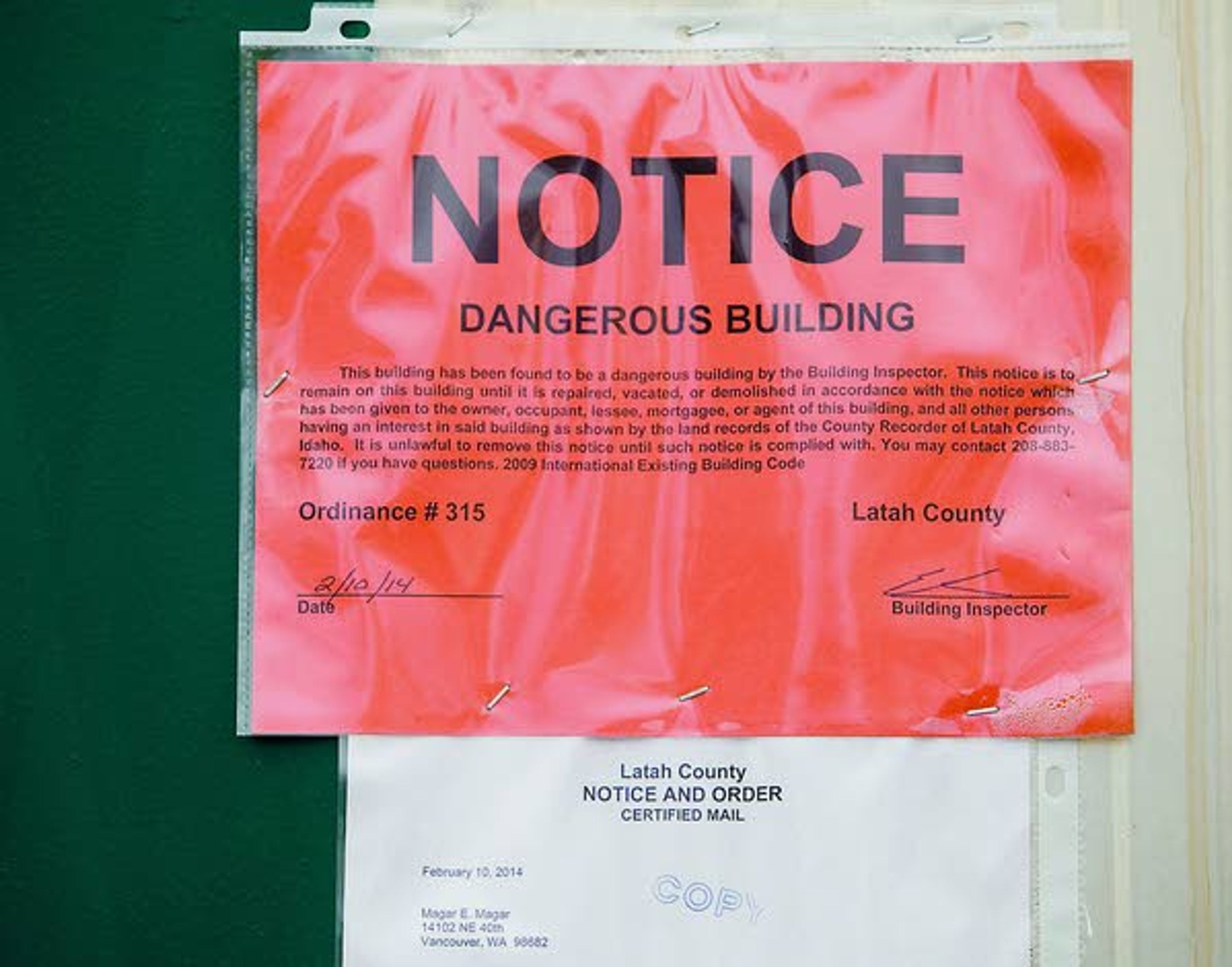 A red tag placed by a Latah County building inspector indicates a trailer at space 347 at Syringa Mobile Home Park east of Moscow cannot be occupied.