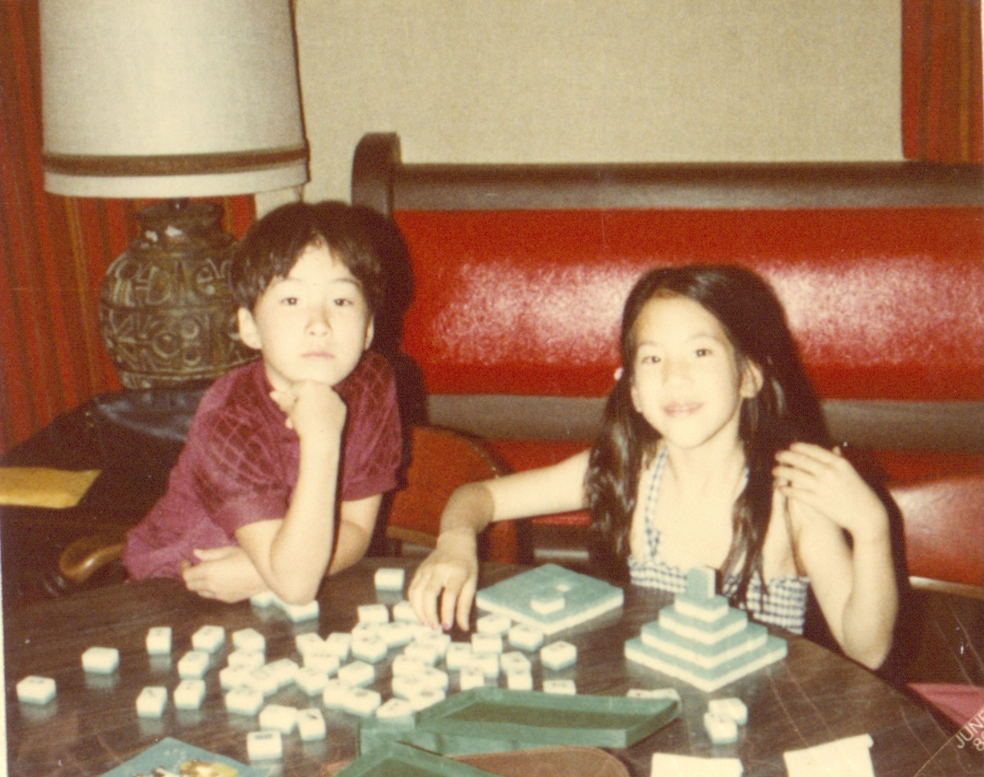 Children play with mahjong tiles during a PAAA gathering, likely in the early 1980s.