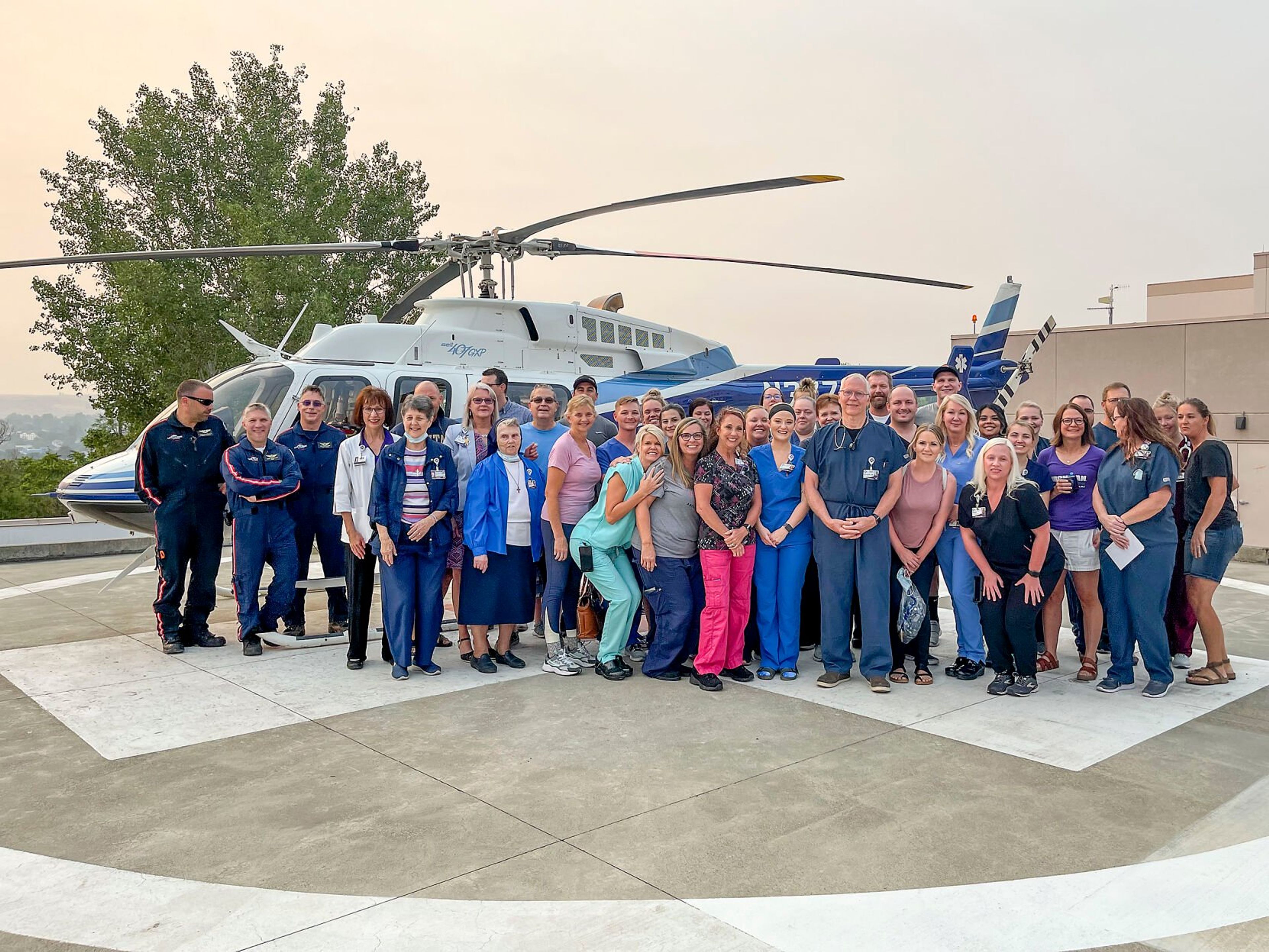 Dr. Jay Hunter is pictured with hospital staff on his last day before retirement.