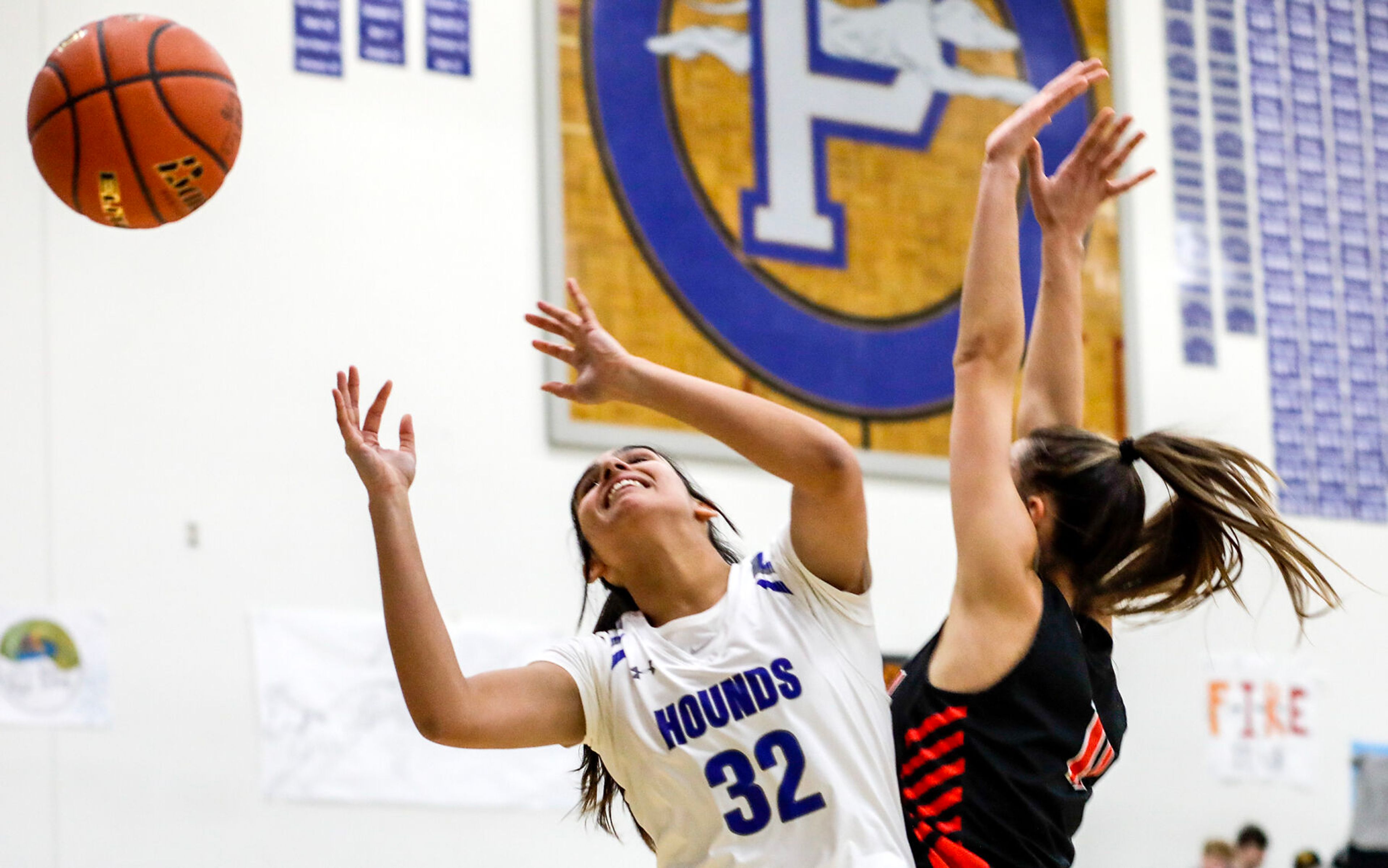 Pullman post Sehra Singh, left, loses the ball as Moscow guard Maya Anderson defends during Saturday's nonleague girls basketball game.