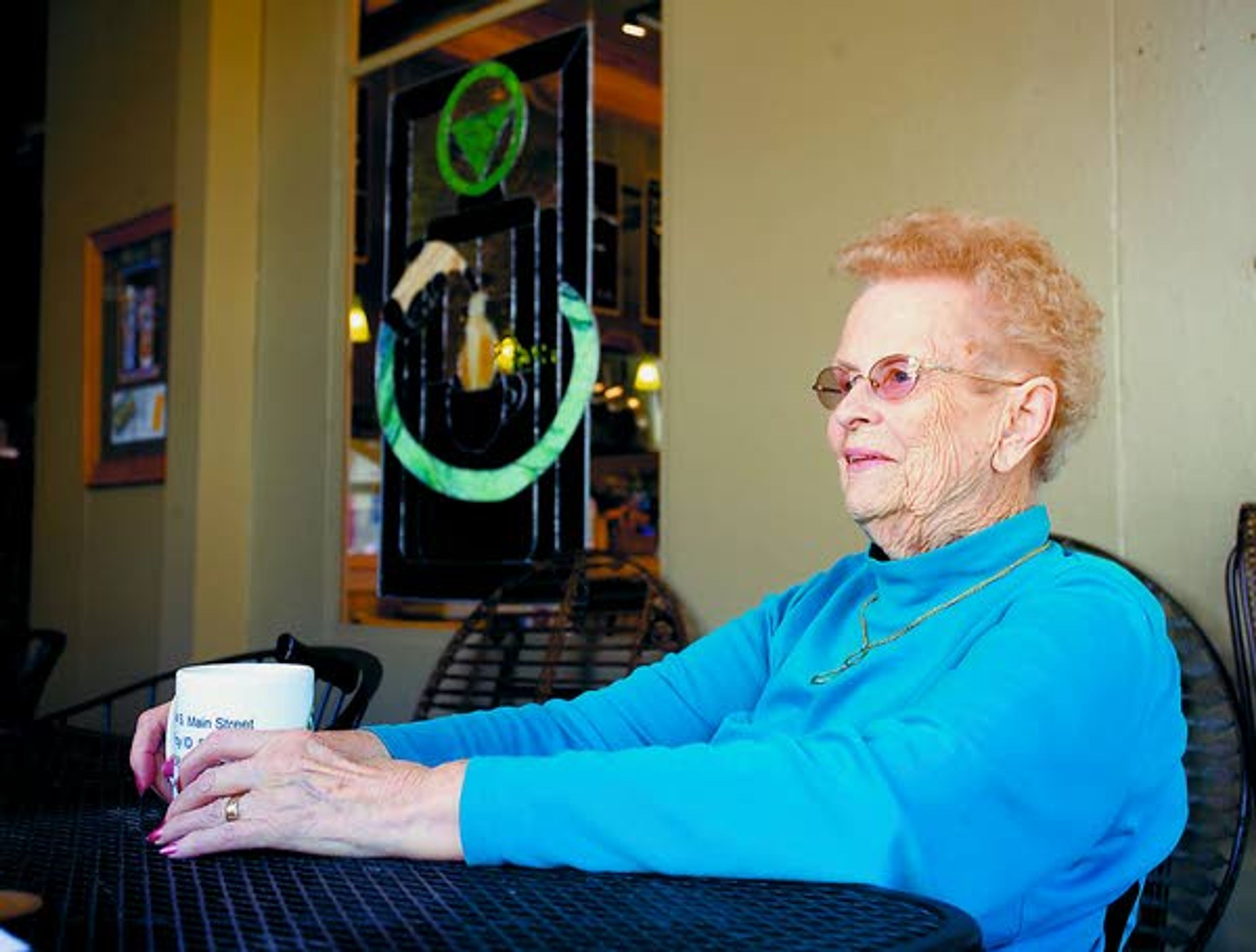 Dorothy Anderston talks during an interview Tuesday at the Filling Station in Troy. The restaurant is built on the former location of a service station.