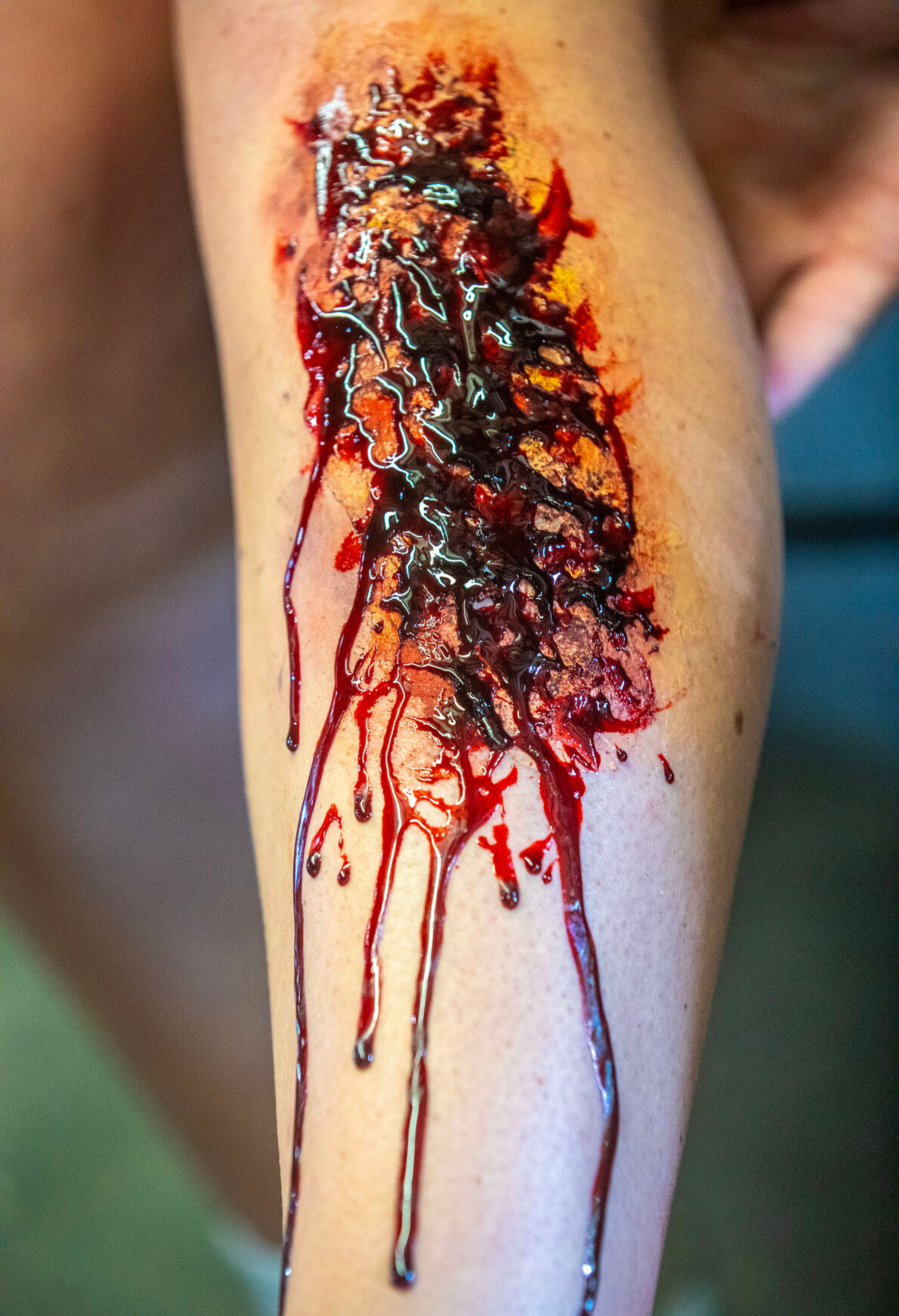 Abi Bevan’s leg bleeds during a disaster simulation of a windstorm Saturday at the Latah County Fairgrounds.