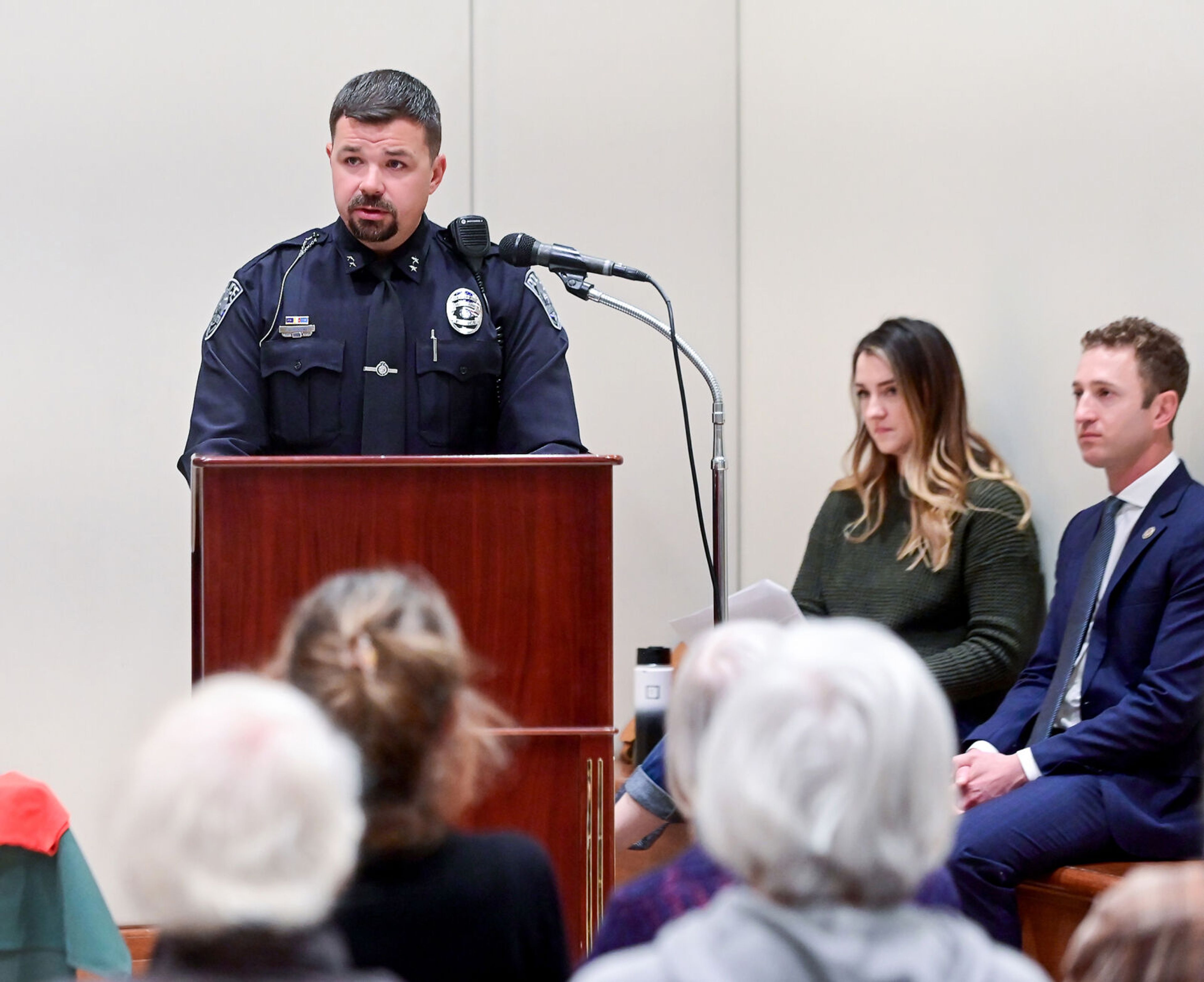 Moscow Police Department chief Anthony Dahlinger addresses the crowd gathered for a United Against Hate summit Monday at the 1912 Center in Moscow. A crowd of roughly 100 community members listen, as well as state and federal representatives, including U.S. Attorney Josh Hurwit, right.