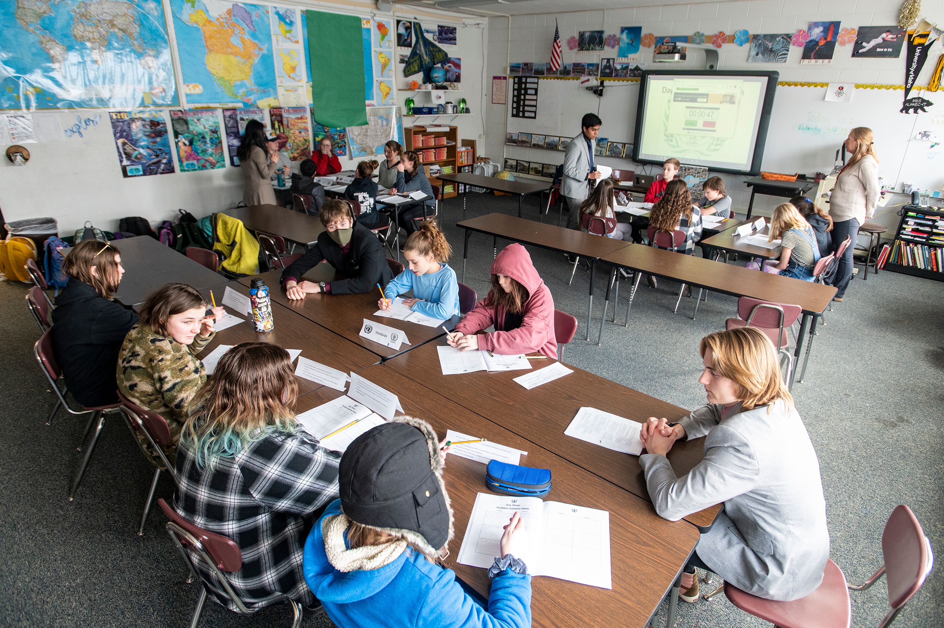 Moscow High School students work with Stacy Albrecht’s sixth grade social studies class for a Model UN event Wednesday afternoon at Moscow Middle School.