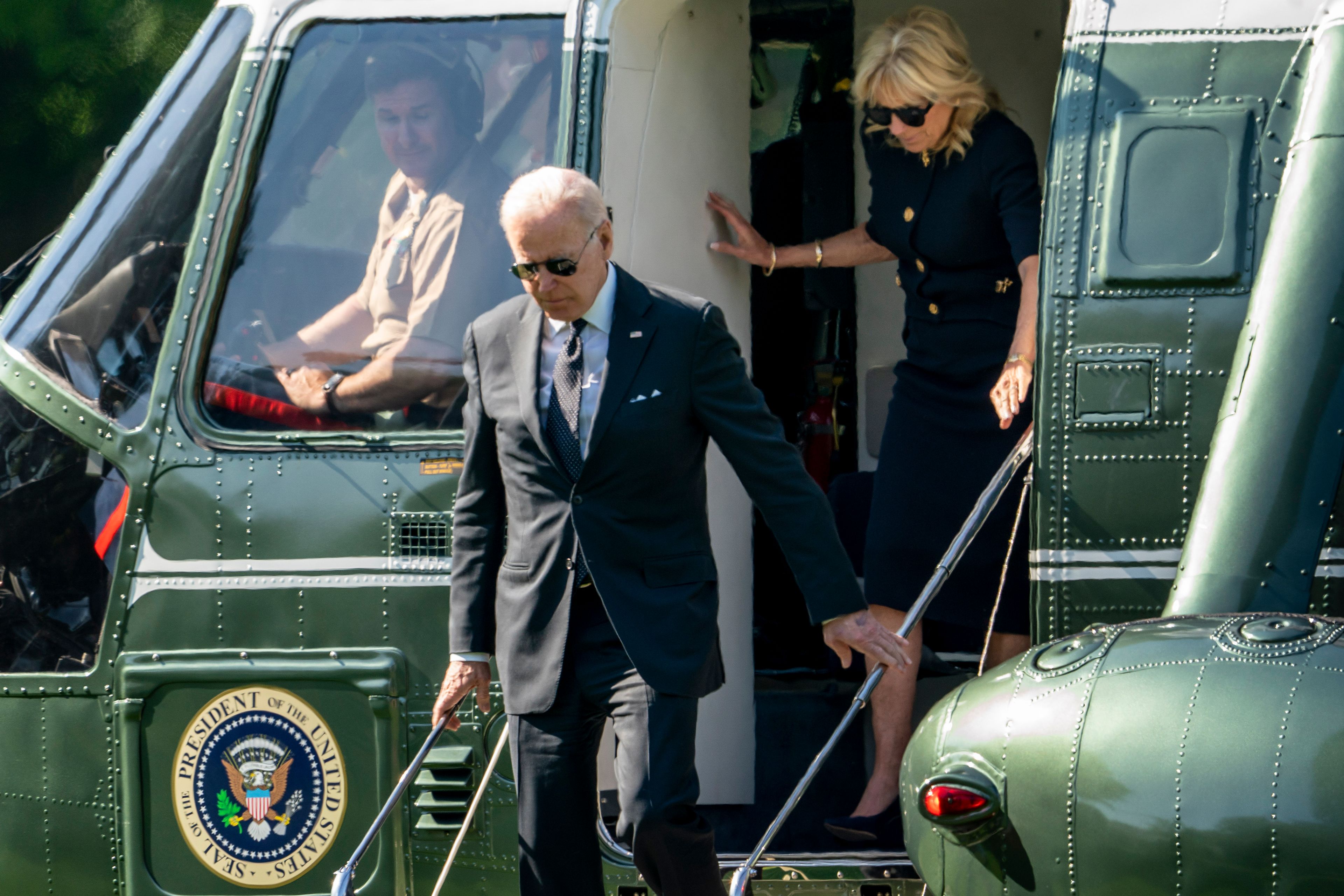 President Joe Biden and first lady Jill Biden arrive on the South Lawn of the White House in Washington, Monday, May 30, 2022, after returning from Wilmington, Del. (AP Photo/Andrew Harnik)