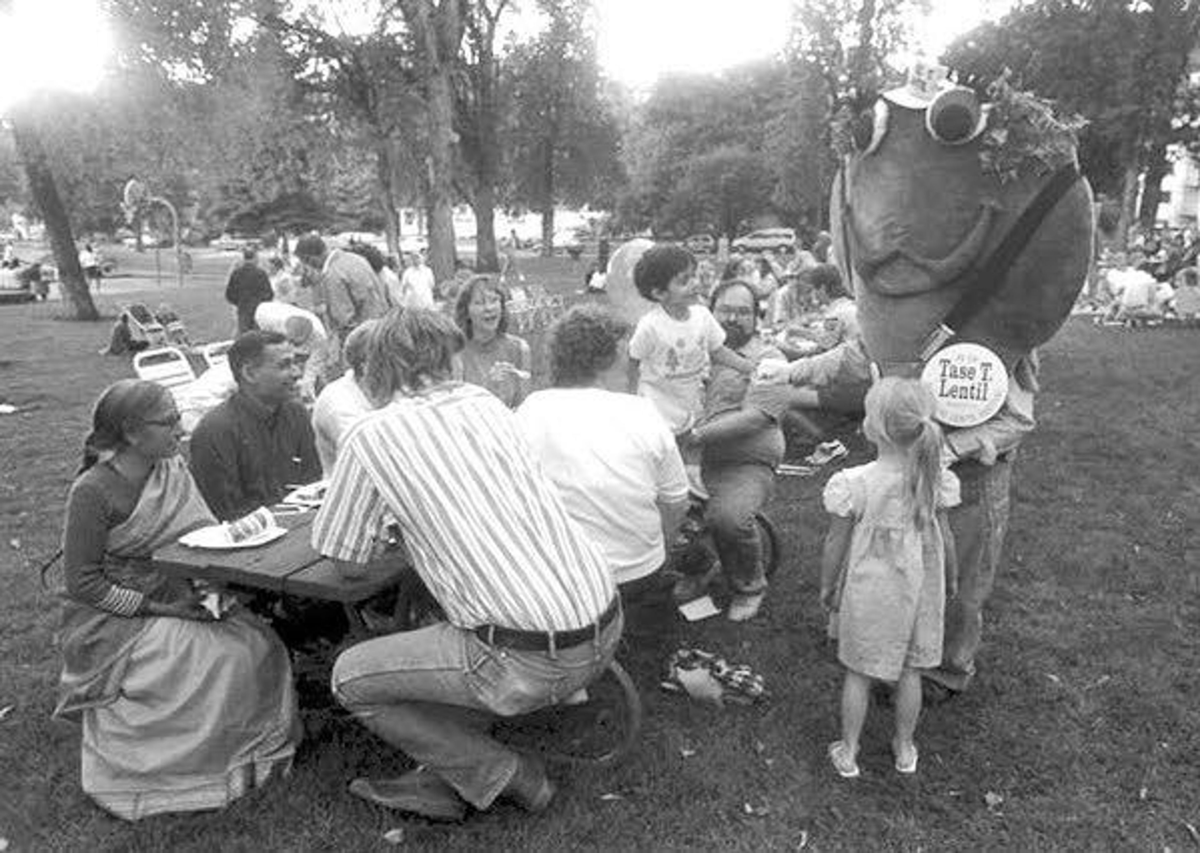 Tase T. Lentil talks to people at the National Lentil Festival in Pullman in 1990.