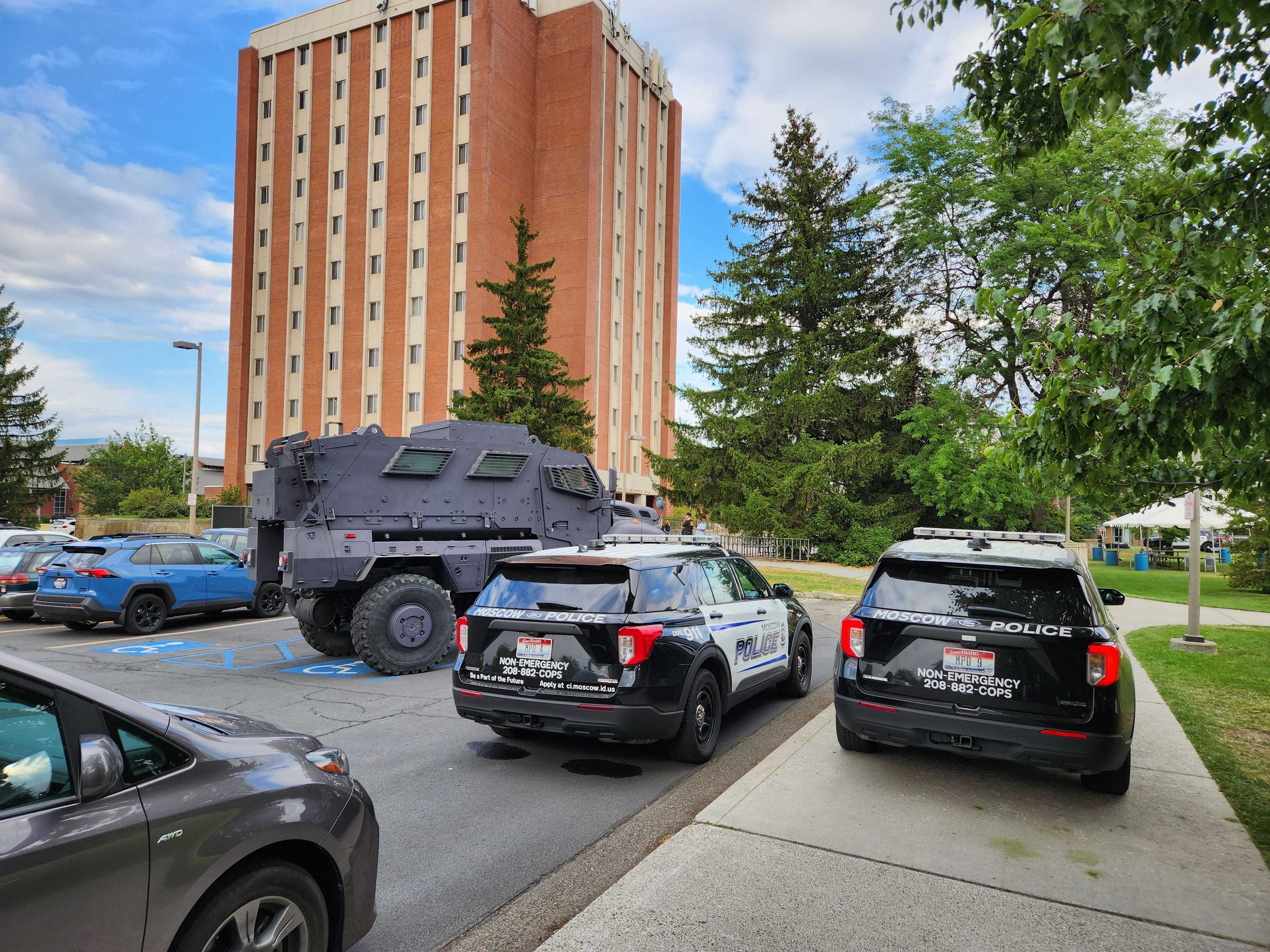 Moscow Police and SWAT team personnel are seen Tuesday afternoon near Theophilus Tower on the University of Idaho campus in Moscow. The Moscow Police Department asked people to leave the building because of an Idaho Department of Correction inmate who walked away from a job site.