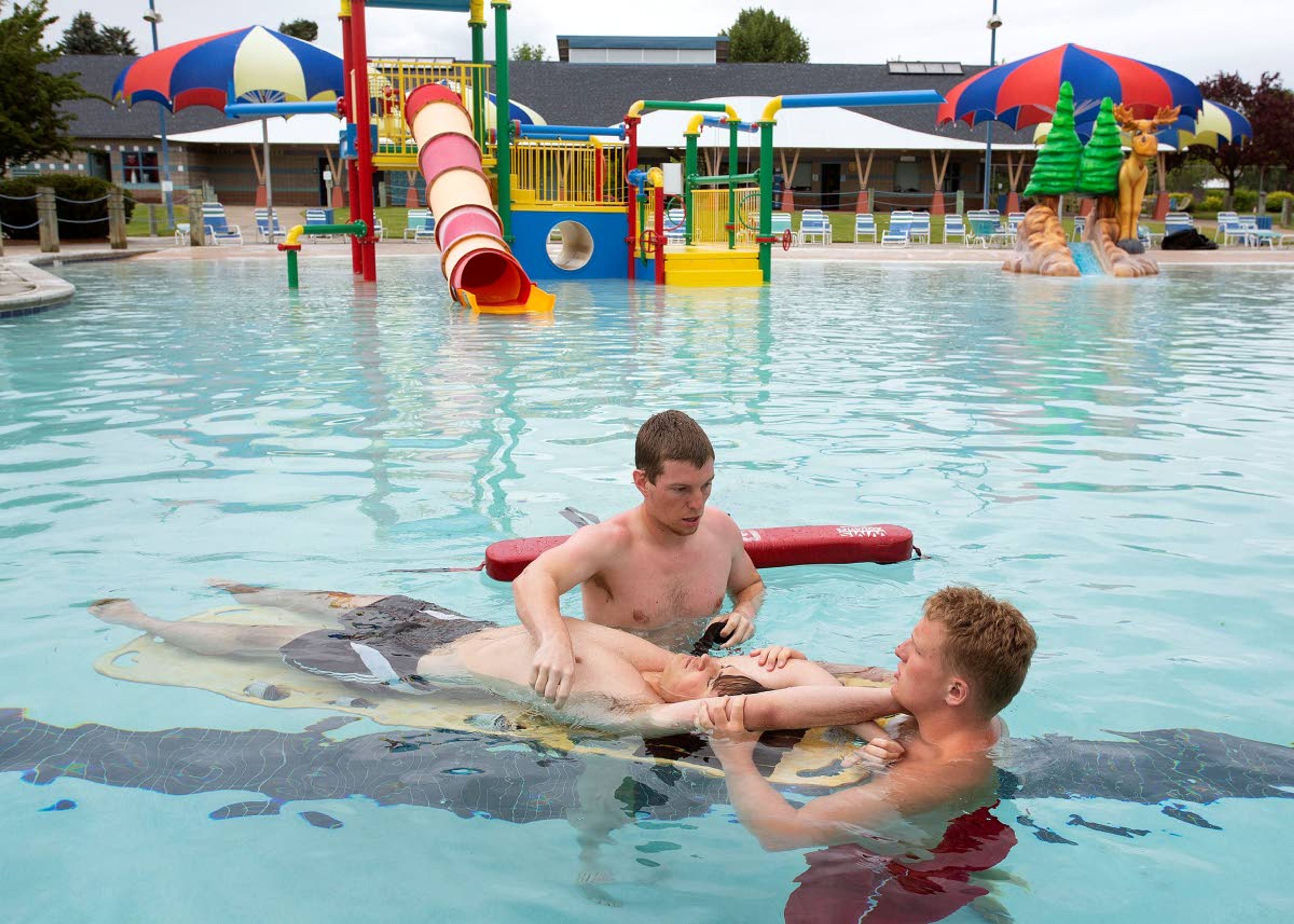 Lifeguard students practice spinal rescues during a certification class late last month at the Hamilton-Lowe Aquatics Center in Moscow. The HLAC has remained closed this year because of coronavirus concerns, but the Moscow City Council voted Monday night to open the facility’s lap pool starting Wednesday.Geoff Crimmins Daily News