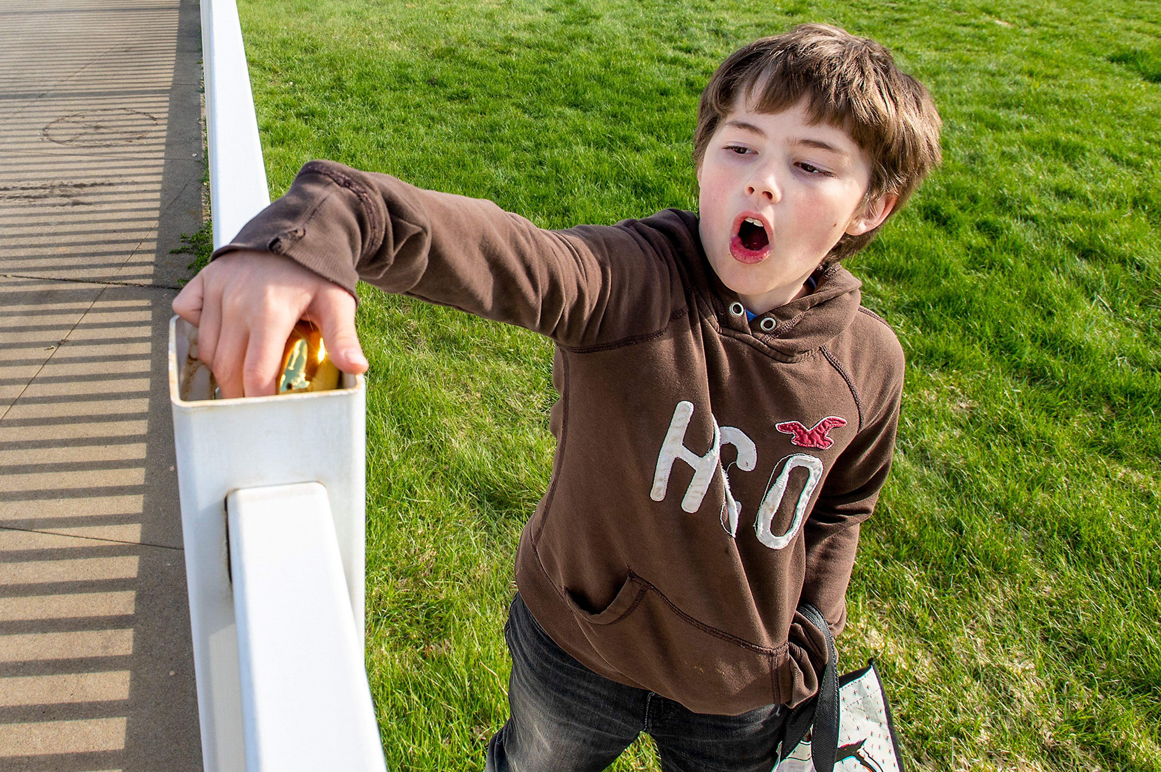 Kaden Barry, 9, of Moscow, finds a hidden golden egg during the annual Easter egg hunt Friday. Those who found golden eggs were able to exchange them for a special Easter-themed prize.