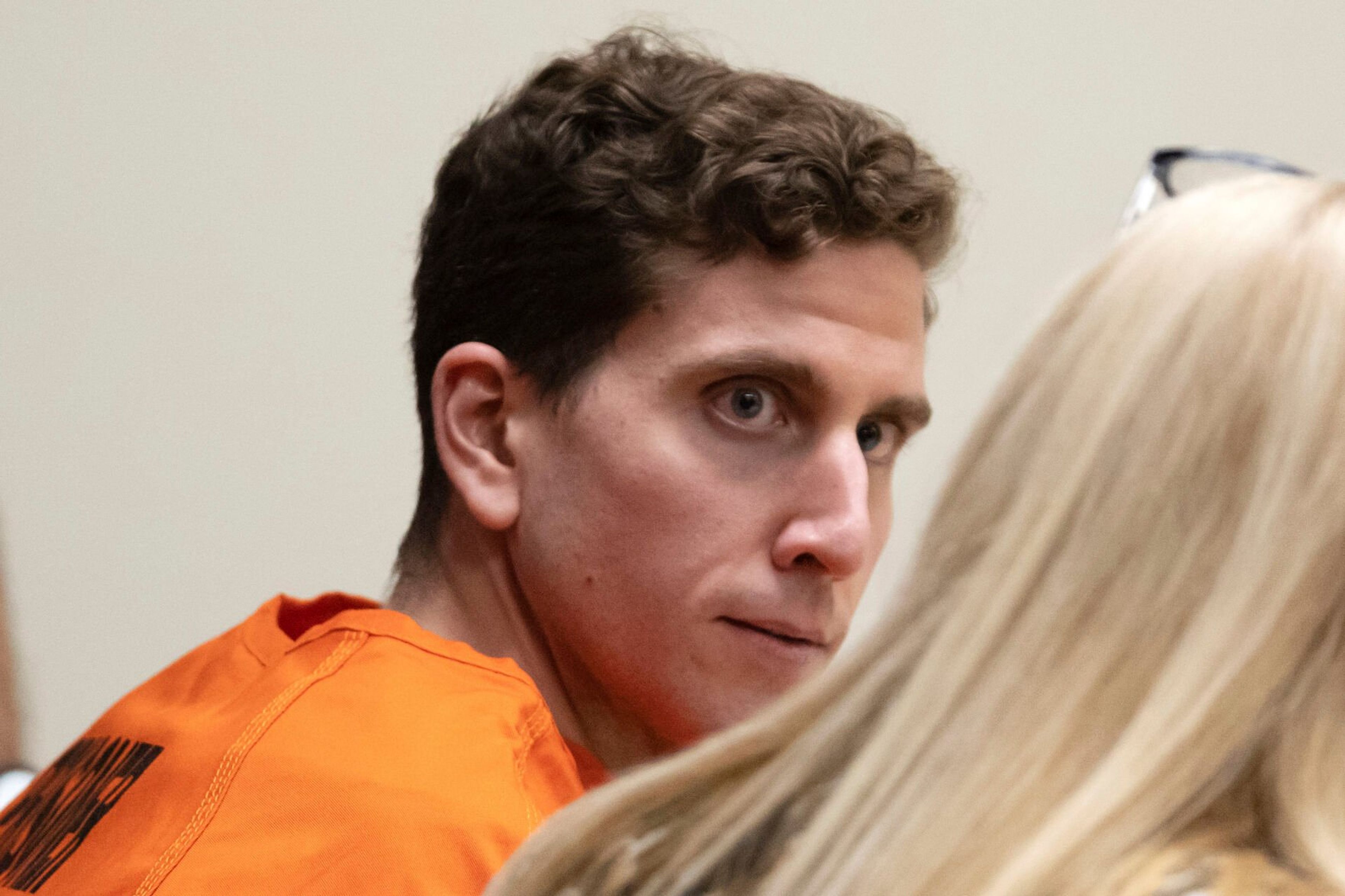 Bryan Kohberger, left, who is accused of killing four University of Idaho students in November 2022, looks toward his attorney, public defender Anne Taylor, right, during a hearing in Latah County District Court, Thursday, Jan. 5, 2023, in Moscow, Idaho. (AP Photo/Ted S. Warren, Pool)