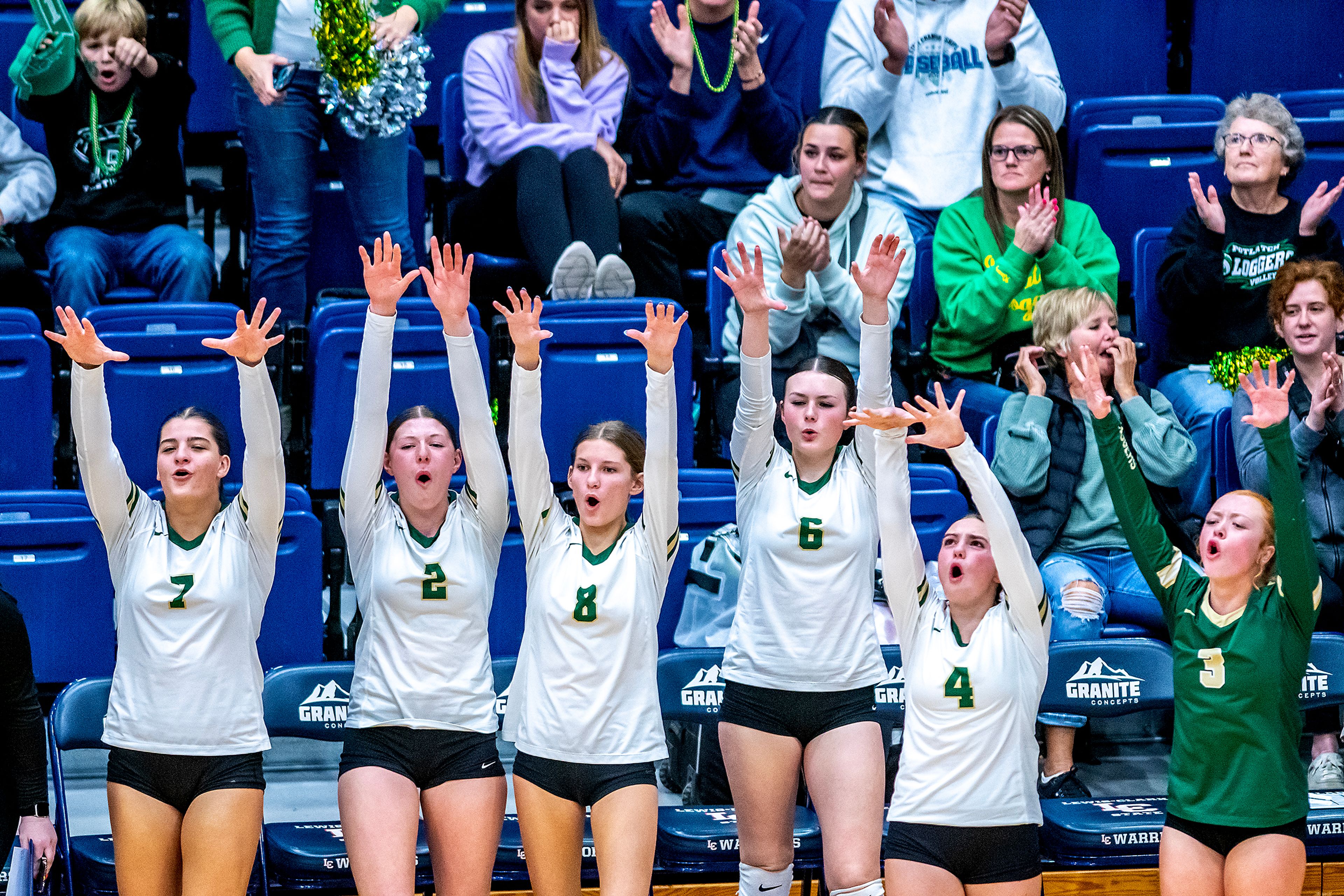 The Potlatch bench celebrates a point against Troy during a 2A district championship Wednesday at the P1FCU Activity Center in Lewiston.