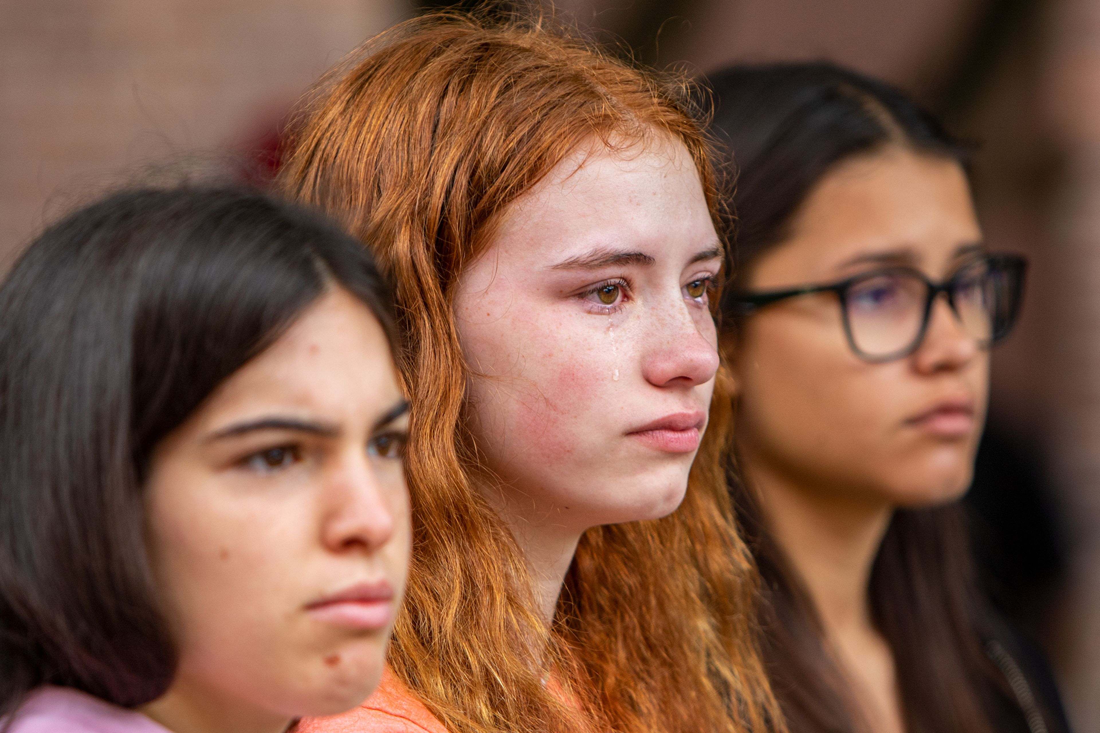 A tear rolls down Lewiston High student Sophia Gill’s cheek during a March for Our Lives rally Saturday morning at Brackenbury Square in downtown Lewiston. March for Our Lives rallies protesting gun violence were held across the country today after the recent occurance of horrific mass shootings in towns like Uvalde, Texas and Buffalo, New York.