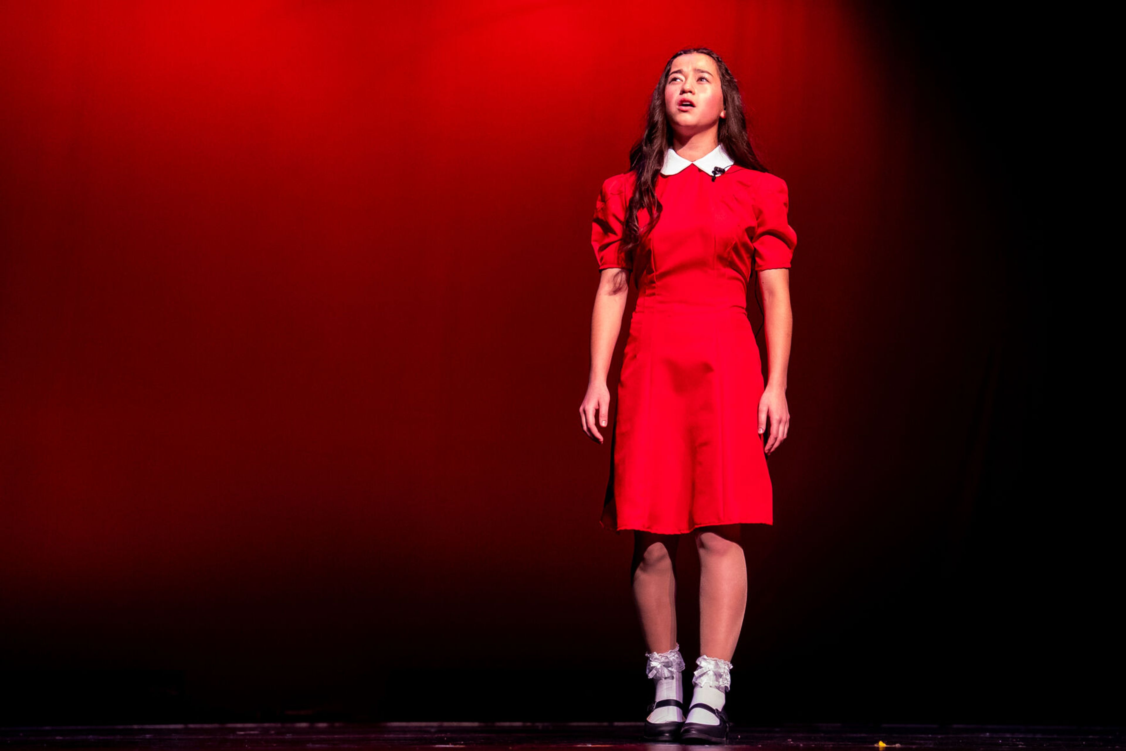 Beth Okamoto preforms the song “Tomorrow” from the musical “Annie” during the Washington Distinguished Young Woman competition on Saturday at Daggy Hall in Pullman.