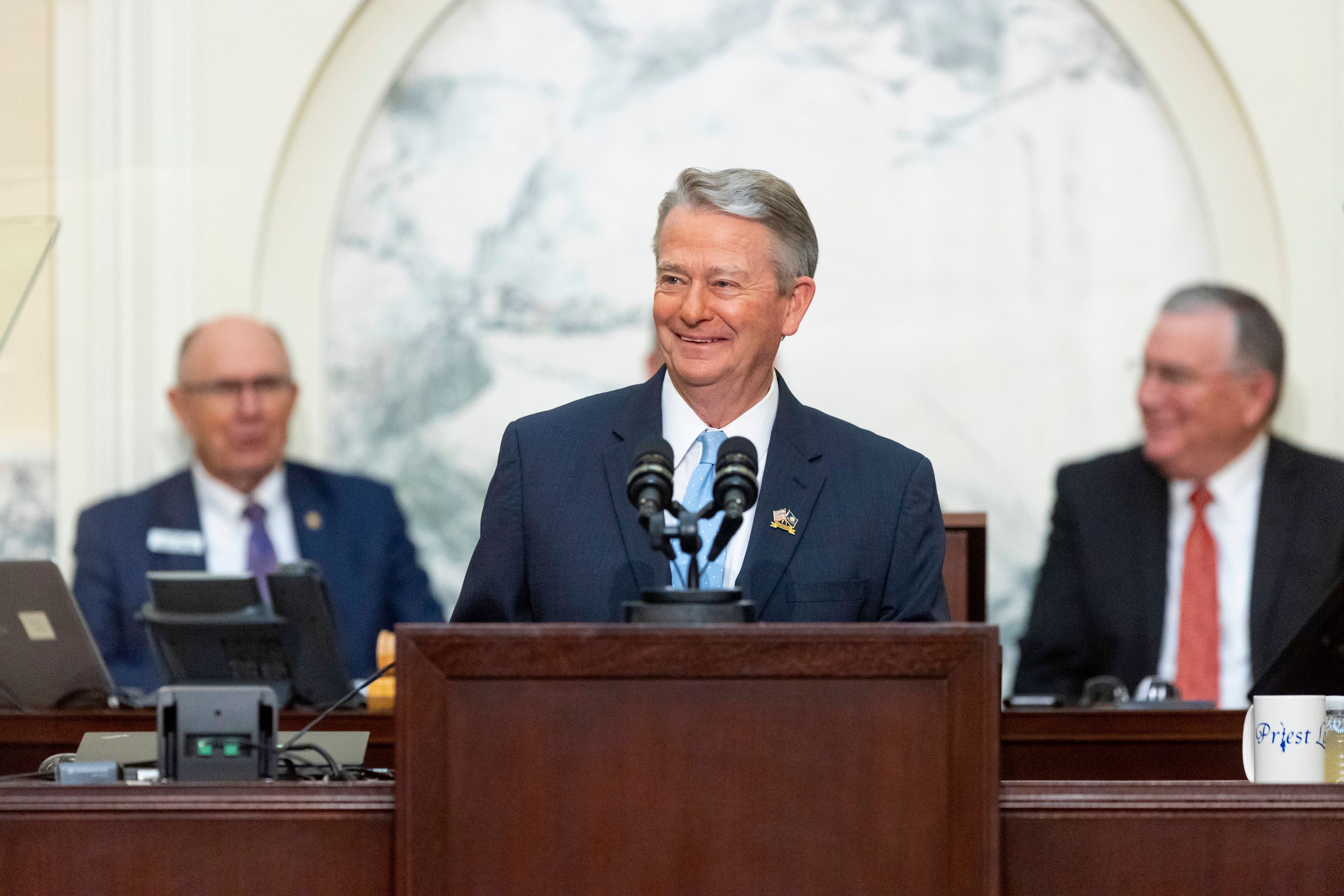 Idaho Gov. Brad Little claps delivers his 2023 State of the State address held at the Idaho State Capitol, Monday, Jan. 9, 2023, in Boise, Idaho. (AP Photo/Kyle Green)