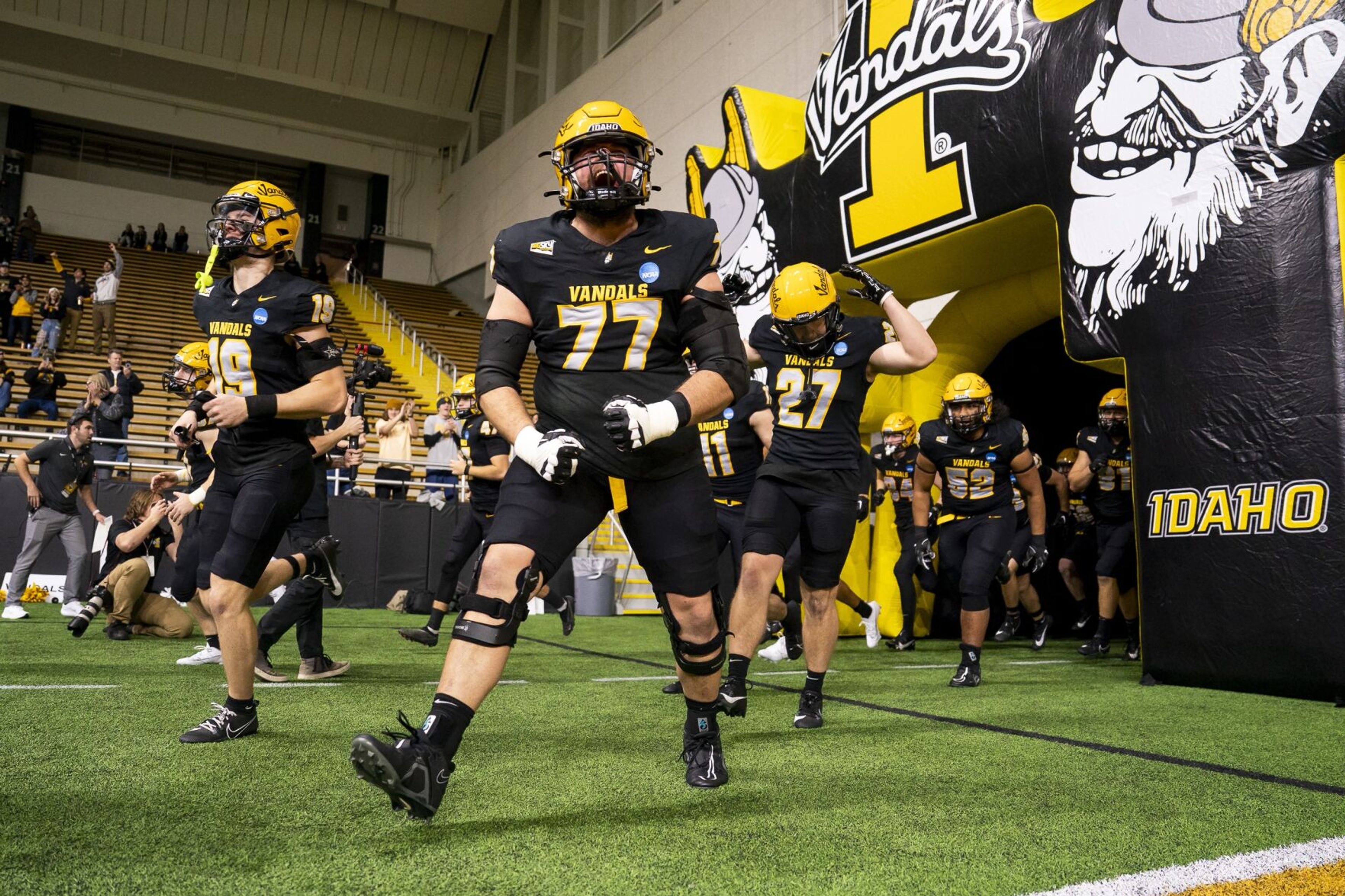 Idaho offensive lineman Paul Lindstrom (77) yells as he takes the field before a game against Southern Illinois for the second round of the 2023 Division I FCS Football Championship Subdivision playoffs Saturday at the P1FCU Kibbie Dome in Moscow.