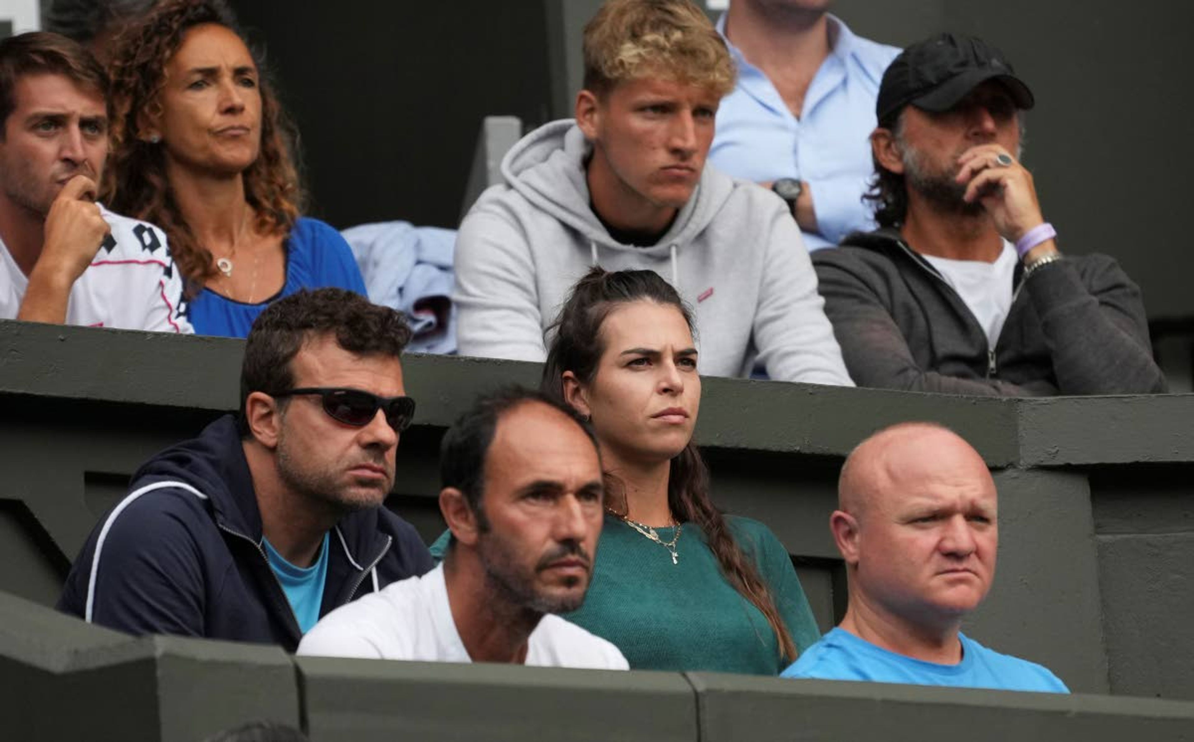 Australia's Ajla Tomljanovic watches her boyfriend Italy's Matteo Berrettini play against Poland's Hubert Hurkacz during the men's singles semifinals match on day eleven of the Wimbledon Tennis Championships in London, Friday, July 9, 2021. (AP Photo/Alberto Pezzali)