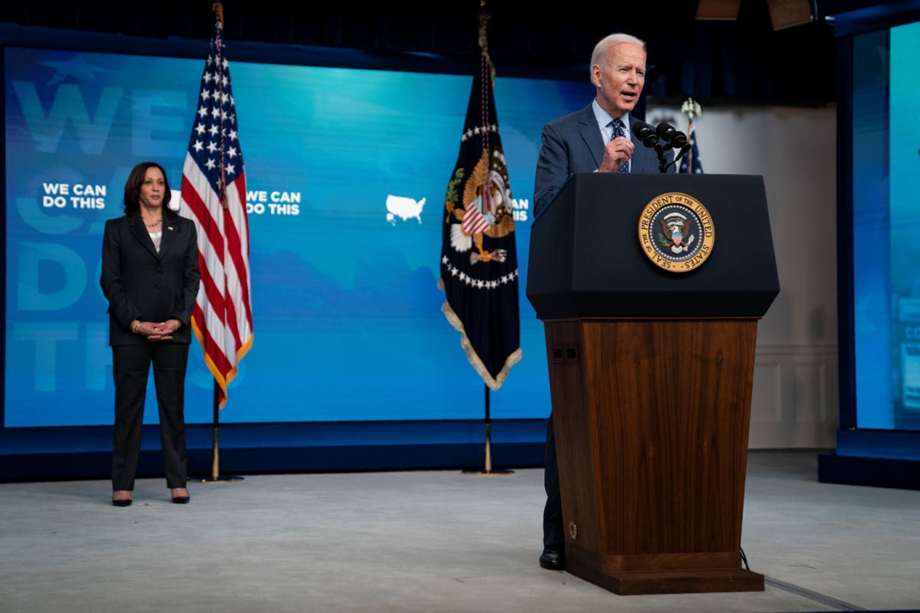 Vice President Kamala Harris listens as President Joe Biden speaks about the COVID-10 vaccination program, in the South Court Auditorium on the White House campus, Wednesday, June 2, 2021, in Washington. (AP Photo/Evan Vucci)