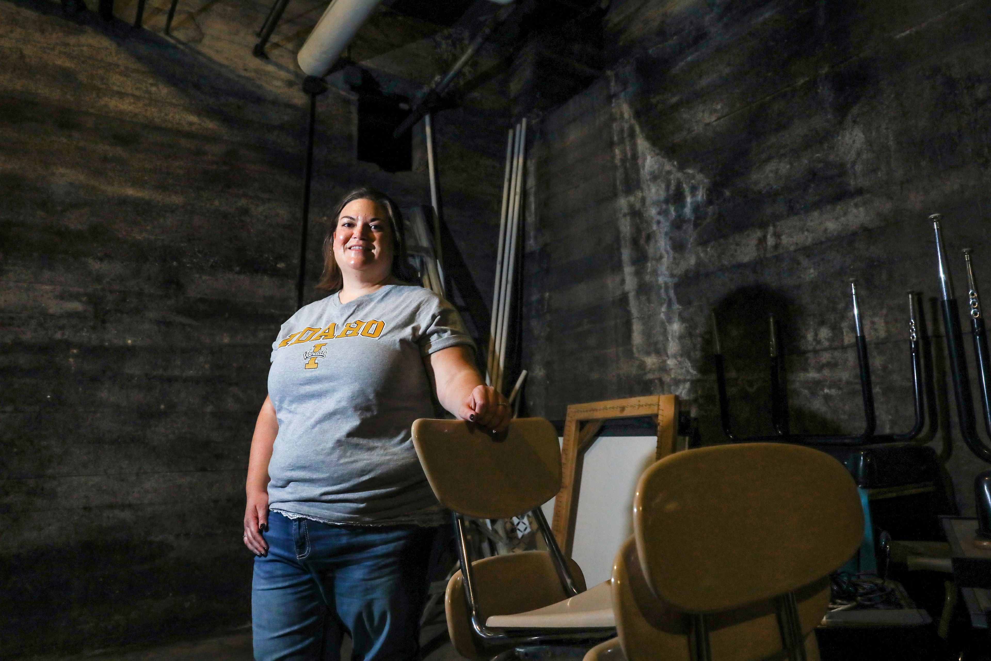 Marianne Sletteland, the principal of J. Russell Elementary School, stands in the basement of the nearly century-old school on Friday in Moscow. Sletteland will be spending a haunting Halloween night in the school as a reward to her students for reaching their fundraising goal.