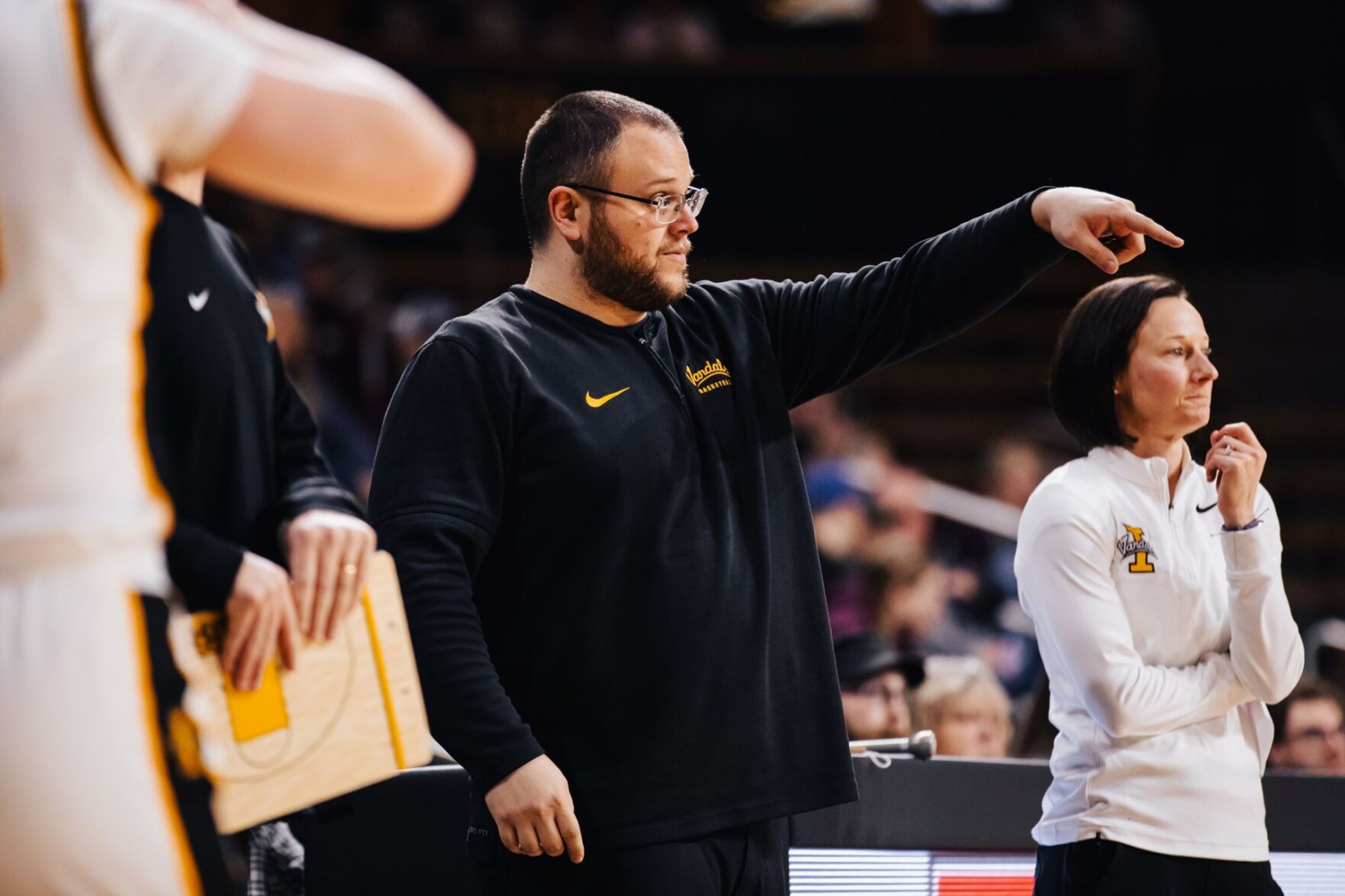 Idaho coach Arthur Moreira (center) coaches from the sideline during a game last season. Moreira was named Idaho's 11th head women's basketball coach in program history.