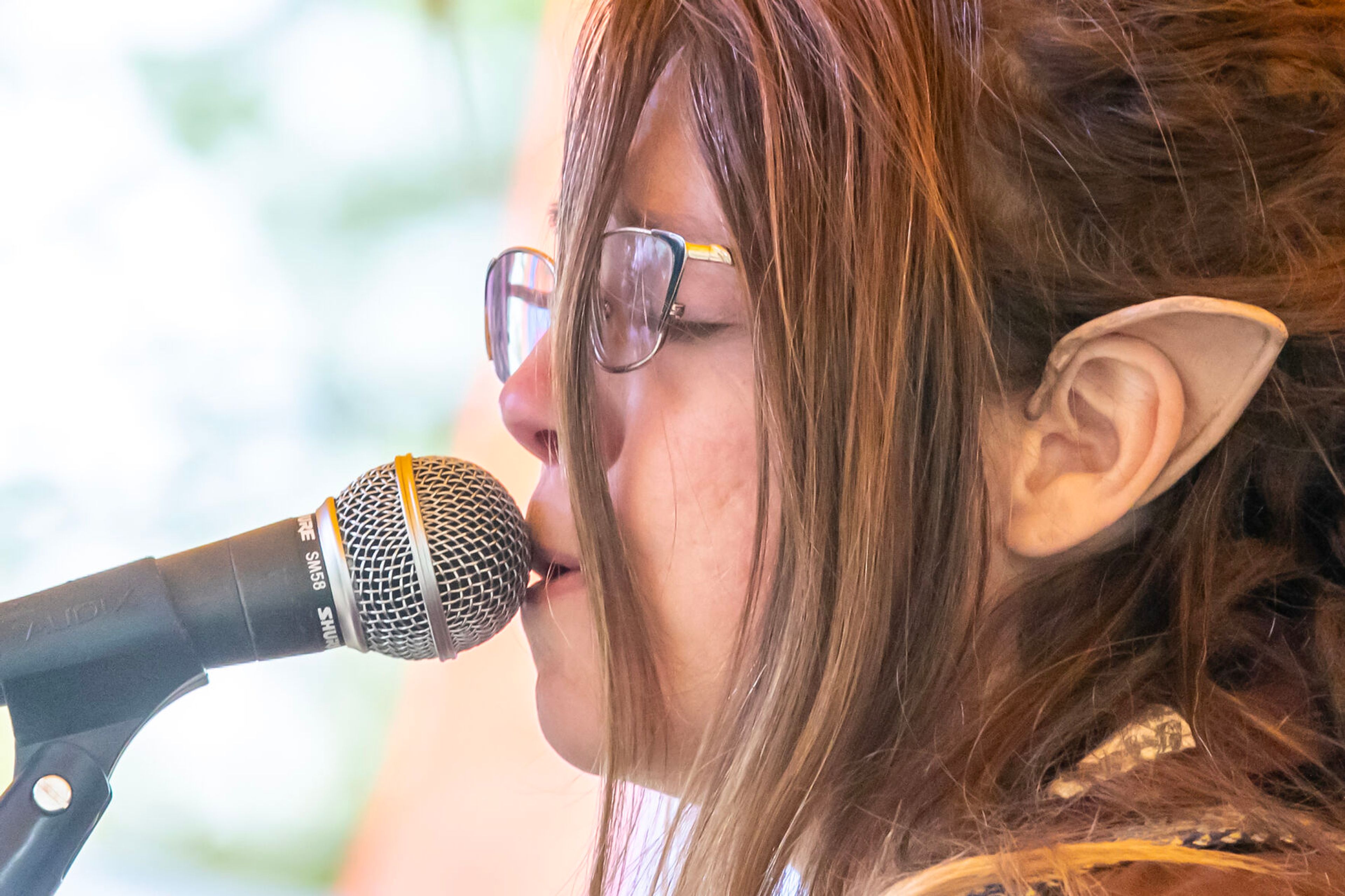 A performer sings at the Moscow Renaissance Fair Saturday at East City Park in Moscow.