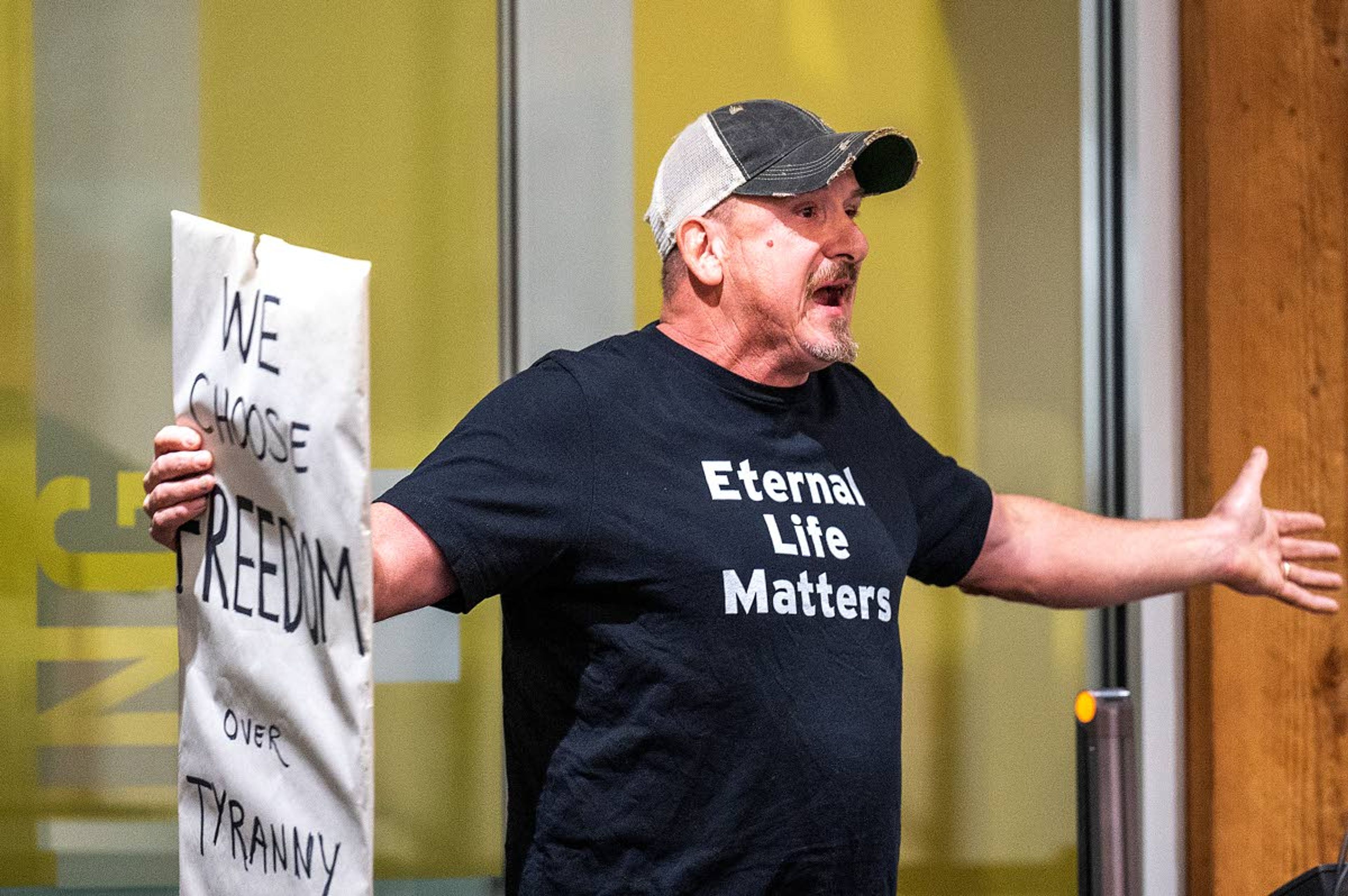 Pete Caster/Lewiston TribuneBrian Bedard, of Lewiston, addresses the Lewiston City Council as he talks about being against a mask mandate Thursday afternoon during a special meeting at the Lewiston City Library.