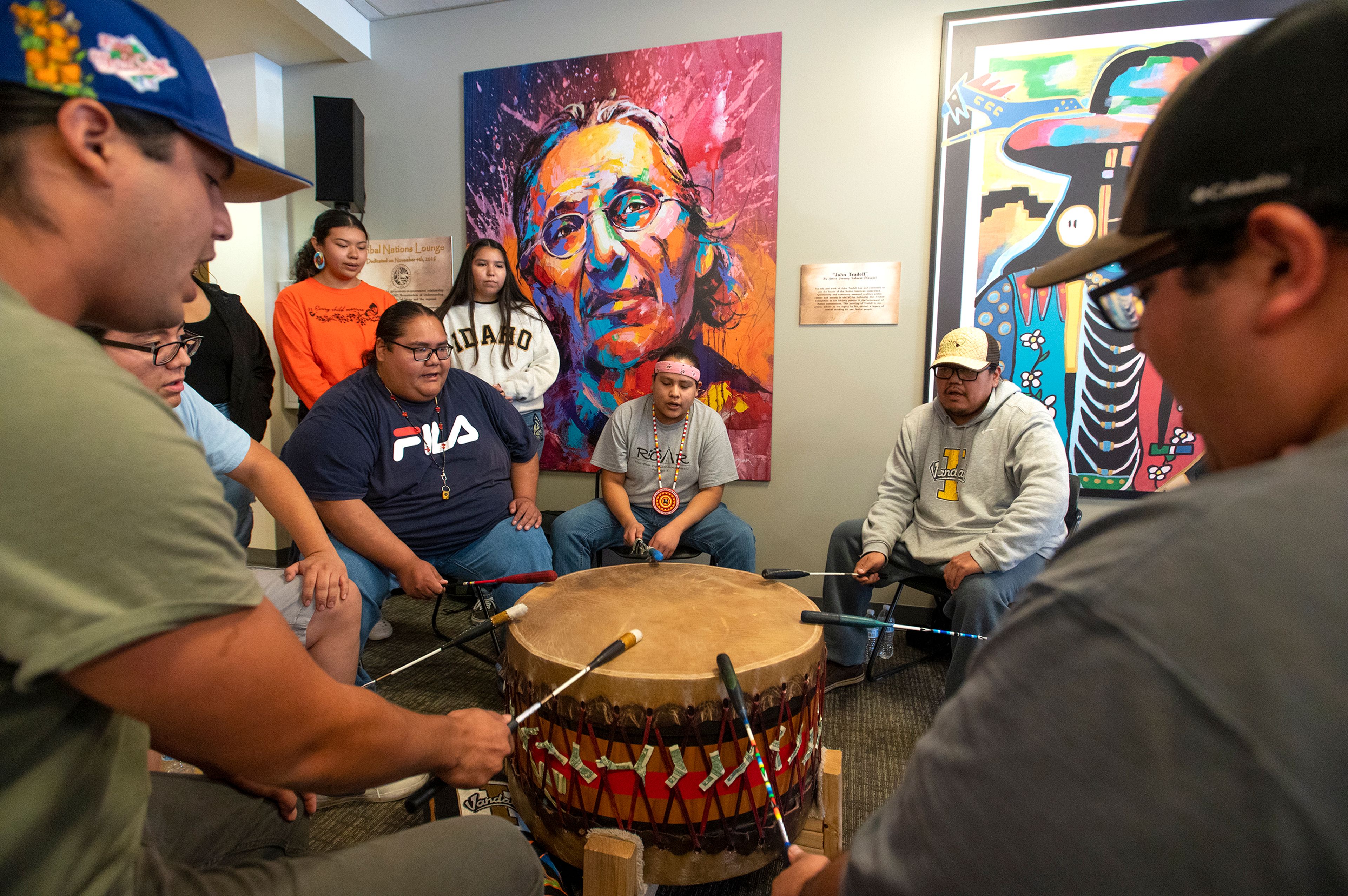 The Vandal Nation Drum group performs during a dedication for the sculpture, “Sacagawea and Jean Baptiste,” at the University of Idaho inside Bruce M. Pitman Center’s Tribal Lounge in Moscow on Friday.