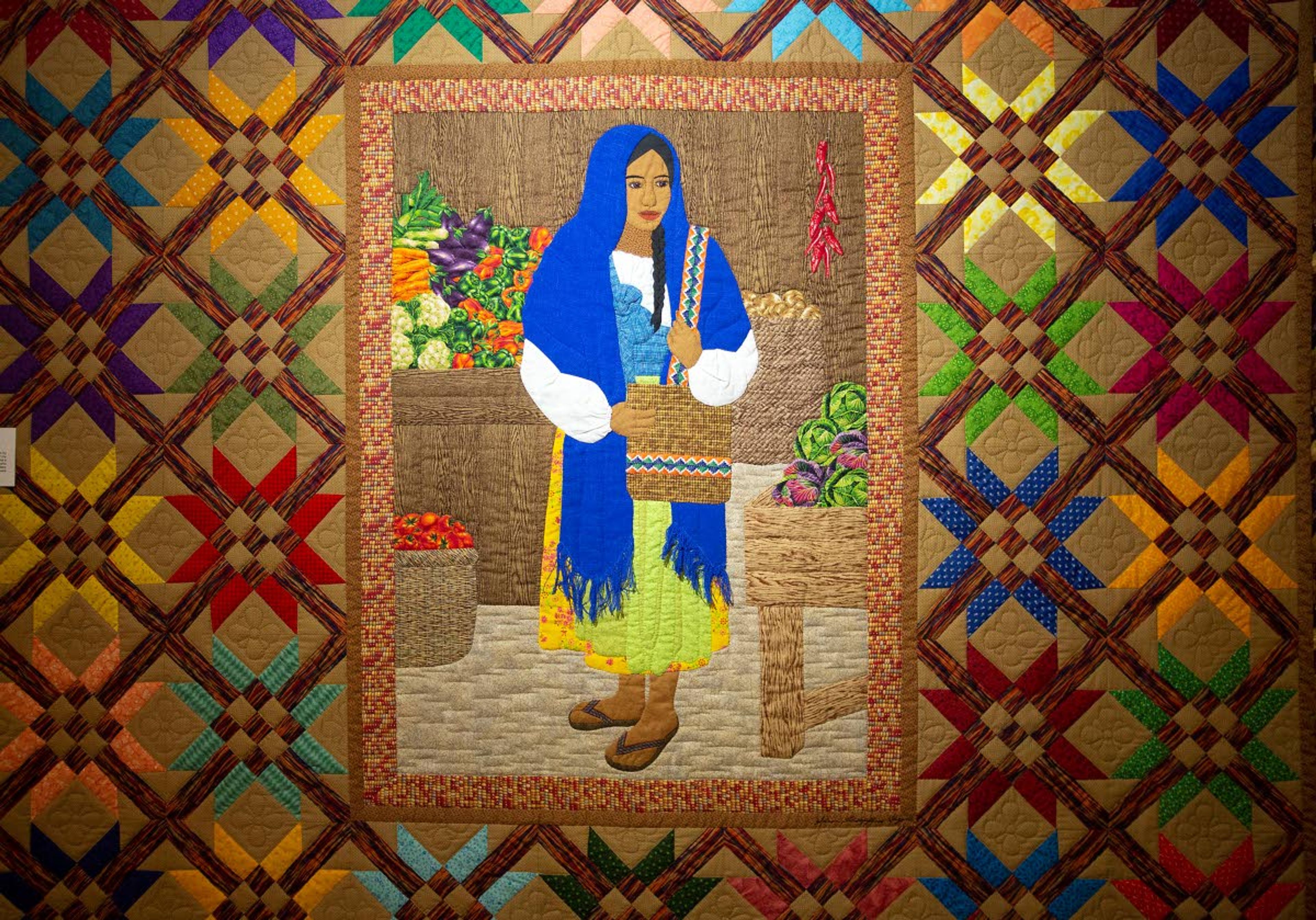 “Mexican Marketplace” is a quilt that Hagen made between 1998 and 2000. The quilt on display at Kascha Quilts in Genesee.