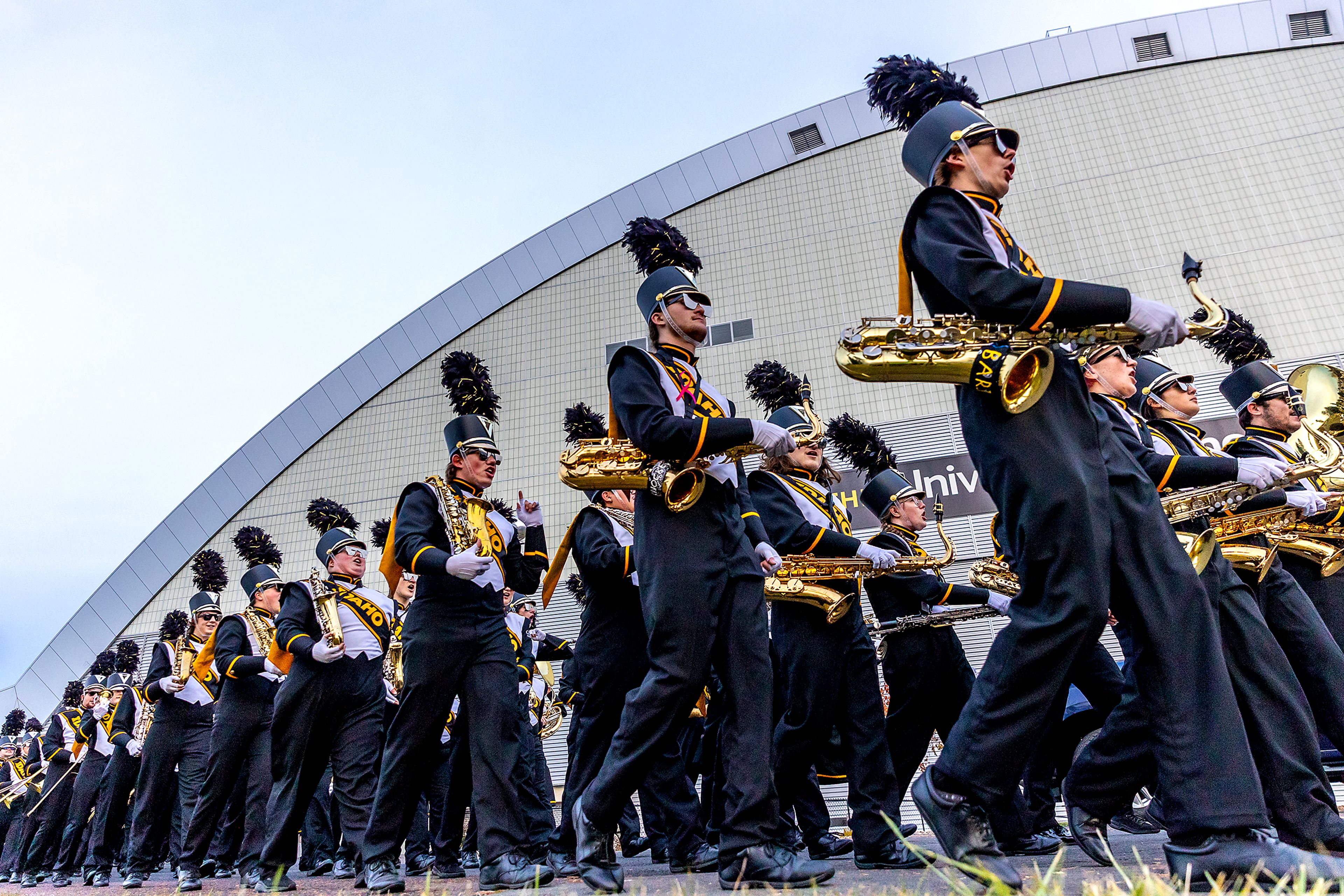 The Vandal Marching Band walks past the Kibbie Dome to perform in the tailgating area before a Big Sky conference game against Weber State Saturday in Moscow.