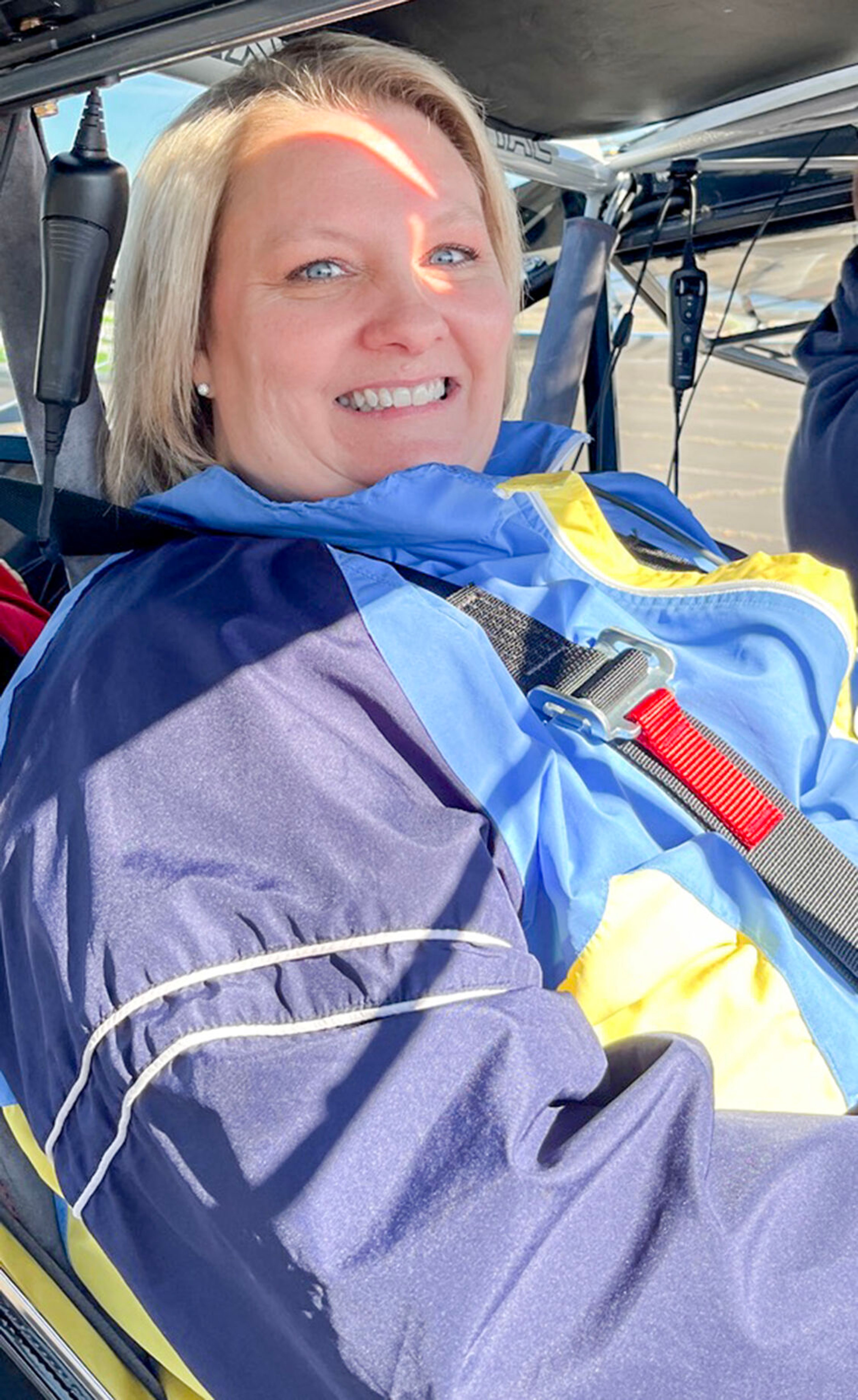 Kristen Blackburn sits in Brandon Petersen’s Rotax 916-powered Kitfox plane.